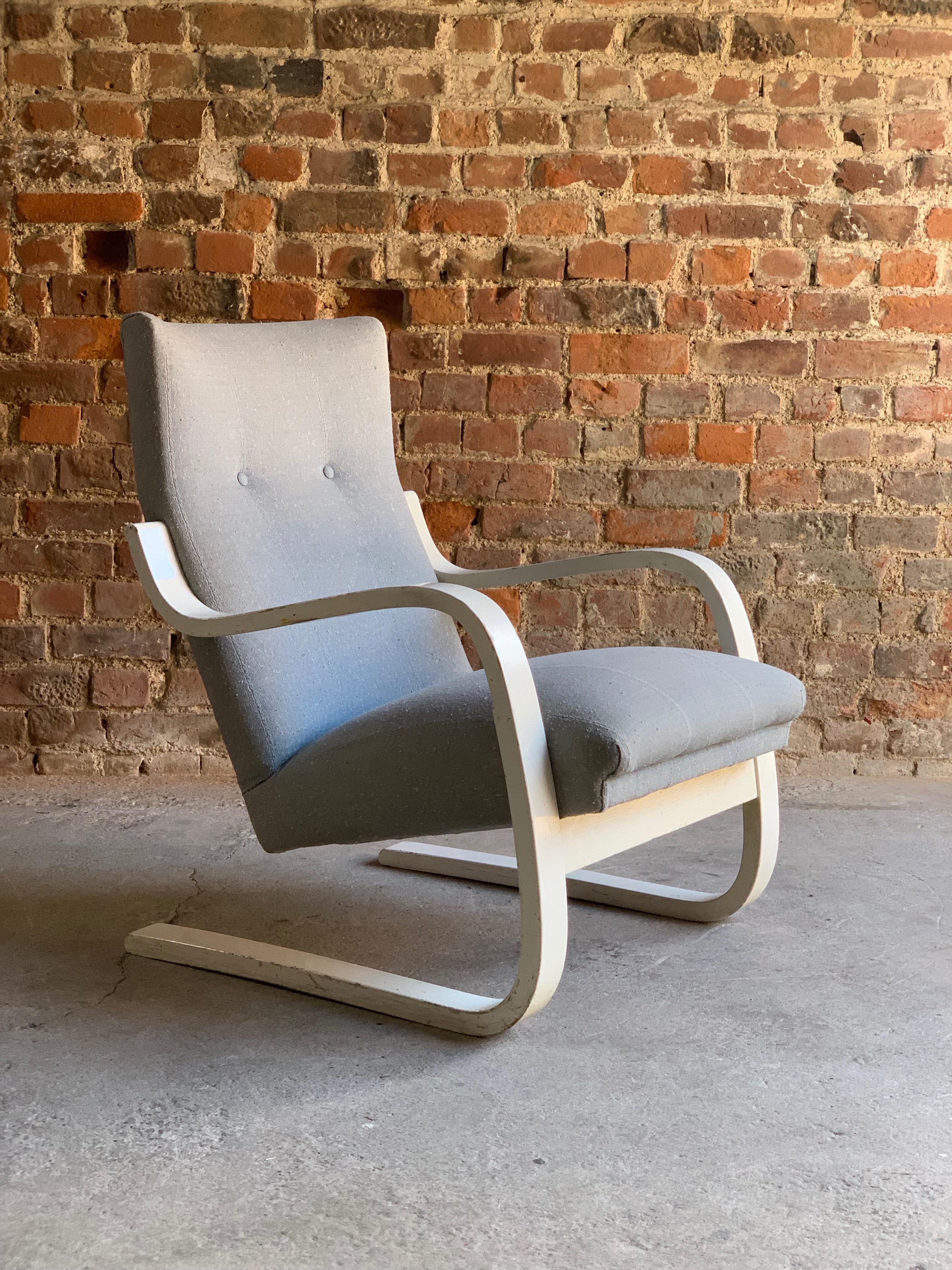 Alvar Aalto Model 401 lounge chair armchair by Artek circa 1938

Rare early Alvar Aalto Series 401 cantilever chair by Artek, Finland circa 1938, the cantilevered birch ’S' shaped frame finished in white gloss with baby blue upholstery, early