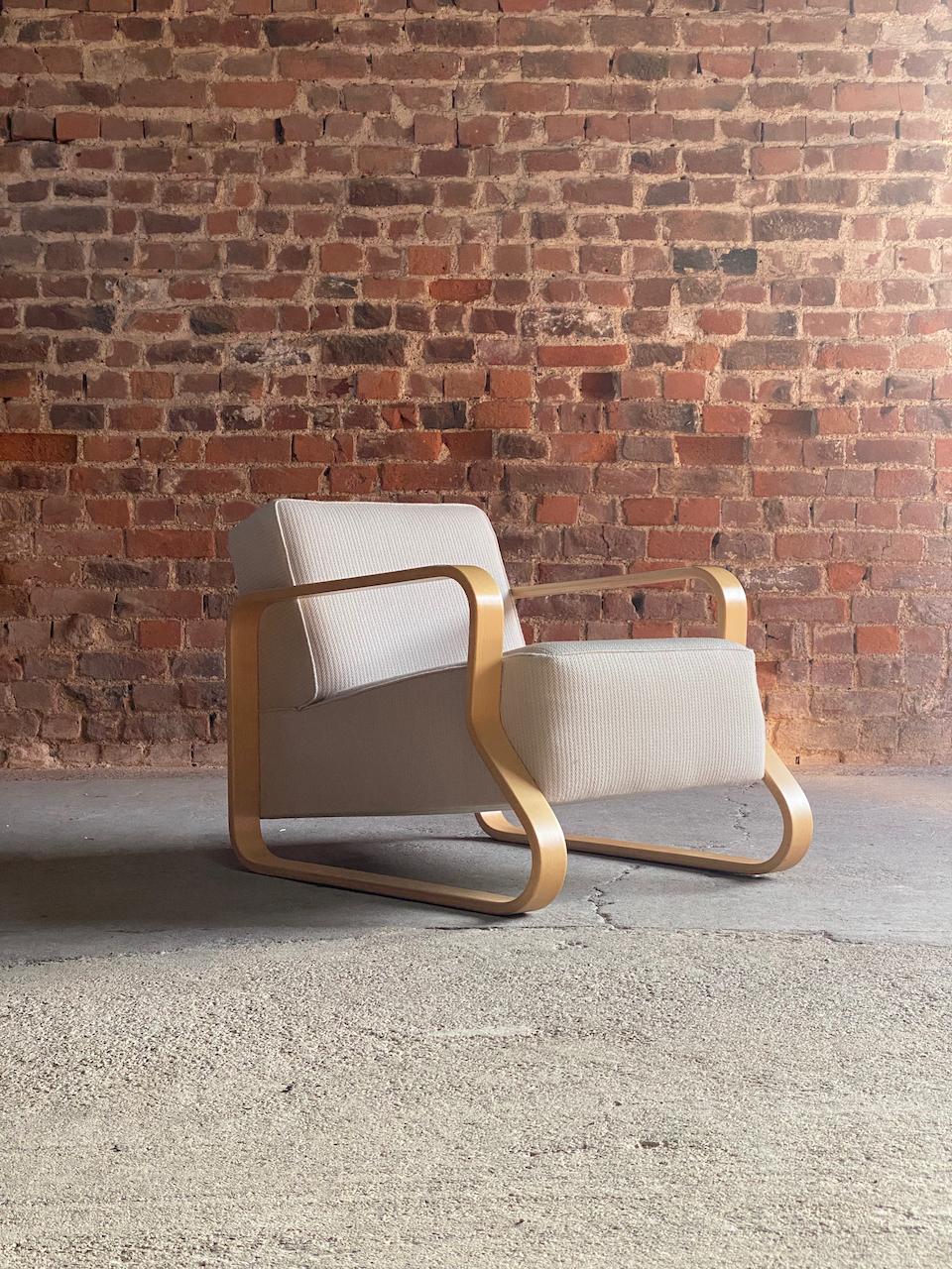 Alvar Aalto Model 44 lounge chair by Artek Finland Circa 1995

Please note price is for 1 chair only.

Magnificent Alvar Aalto Model 44 Lounge Chair by Artek Finland circa 1995, upholstered in ivory herringbone wool, the low-set Aalto Lounge chair