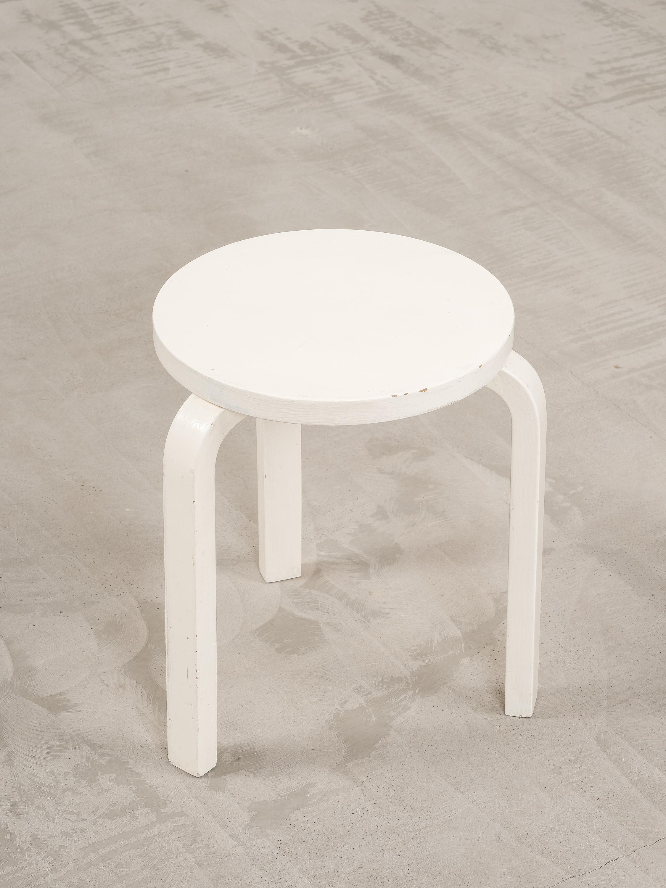 Alvar Aalto Model 60 stool, circa 1950s. Bent solid birch and birch plywood. Painted over by previous owner with white paint which really adds character.

The Model 60 stool was first introduced in 1933 in the Fortnum and Mason's Exhibition in