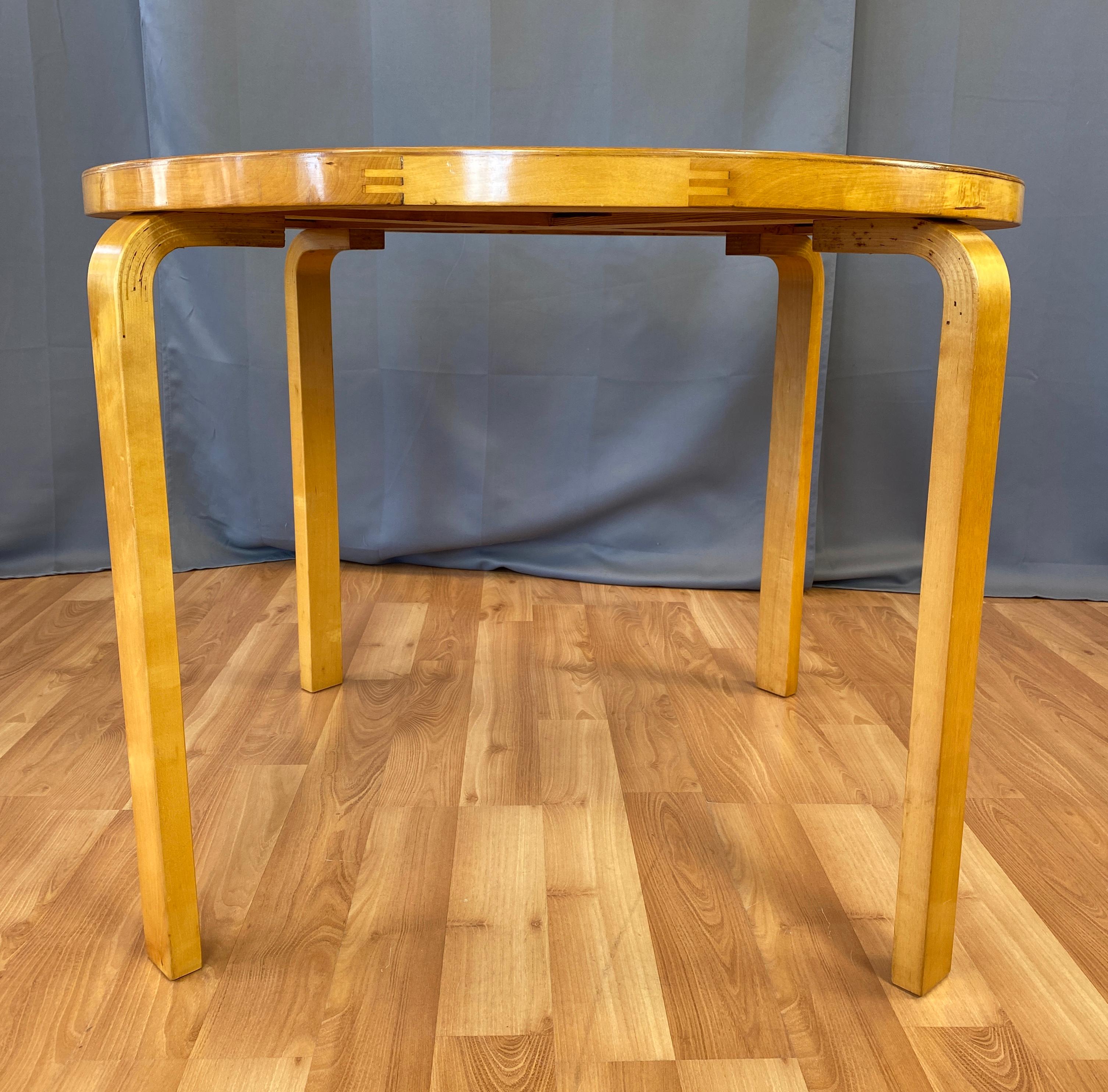 Offered here is a Alvar Aalto Model 91 dining table, a rare post war production circa 1946-1956 
Laminated birch top and solid bentwood legs. Hedemora, for Artek.
 