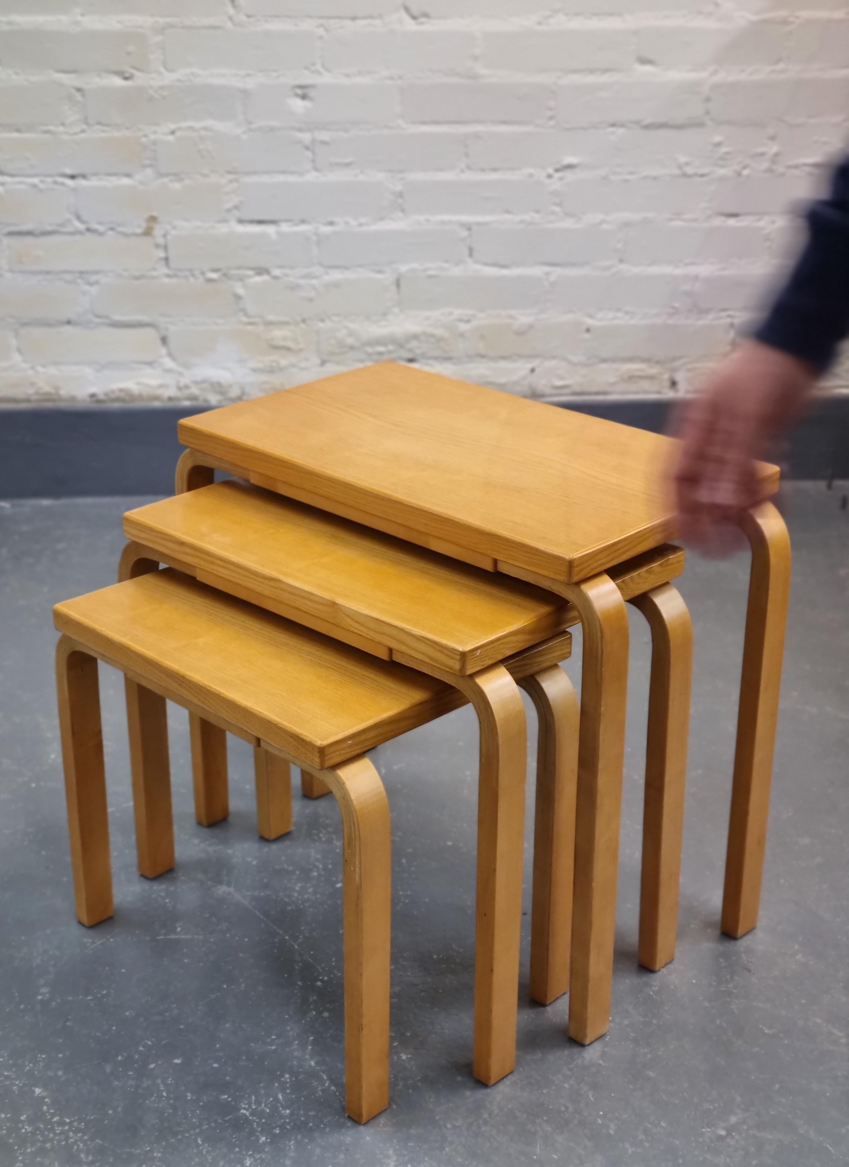 The perfect practical side table for any scandinavian or modern interior, especially with challenging spaces as you can save space with the nesting tables. Measuring 60x35, 52x35 and 44x35. 
The tables are in beautiful original condition and all are