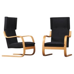 Alvar Aalto Pareja de sillones cantilever "36/401" de tela negra, años 50