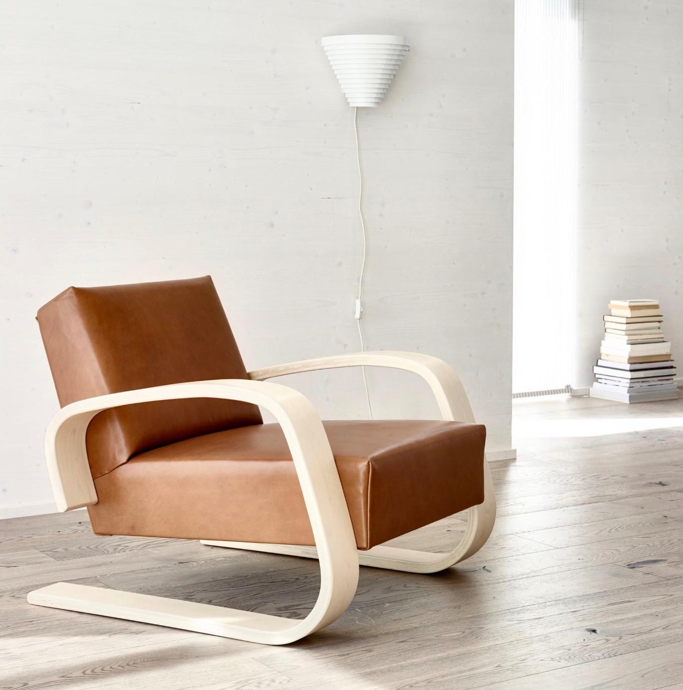 Alvar Aalto Pair of 400 ‘Tank’ Armchair for Artek. Designed in 1936. New, current production. Please note: the price is for 2 chairs with Kvadat Tonus (F100 fabric group) and stained armrests. Other configurations on request.

As voluminous as it