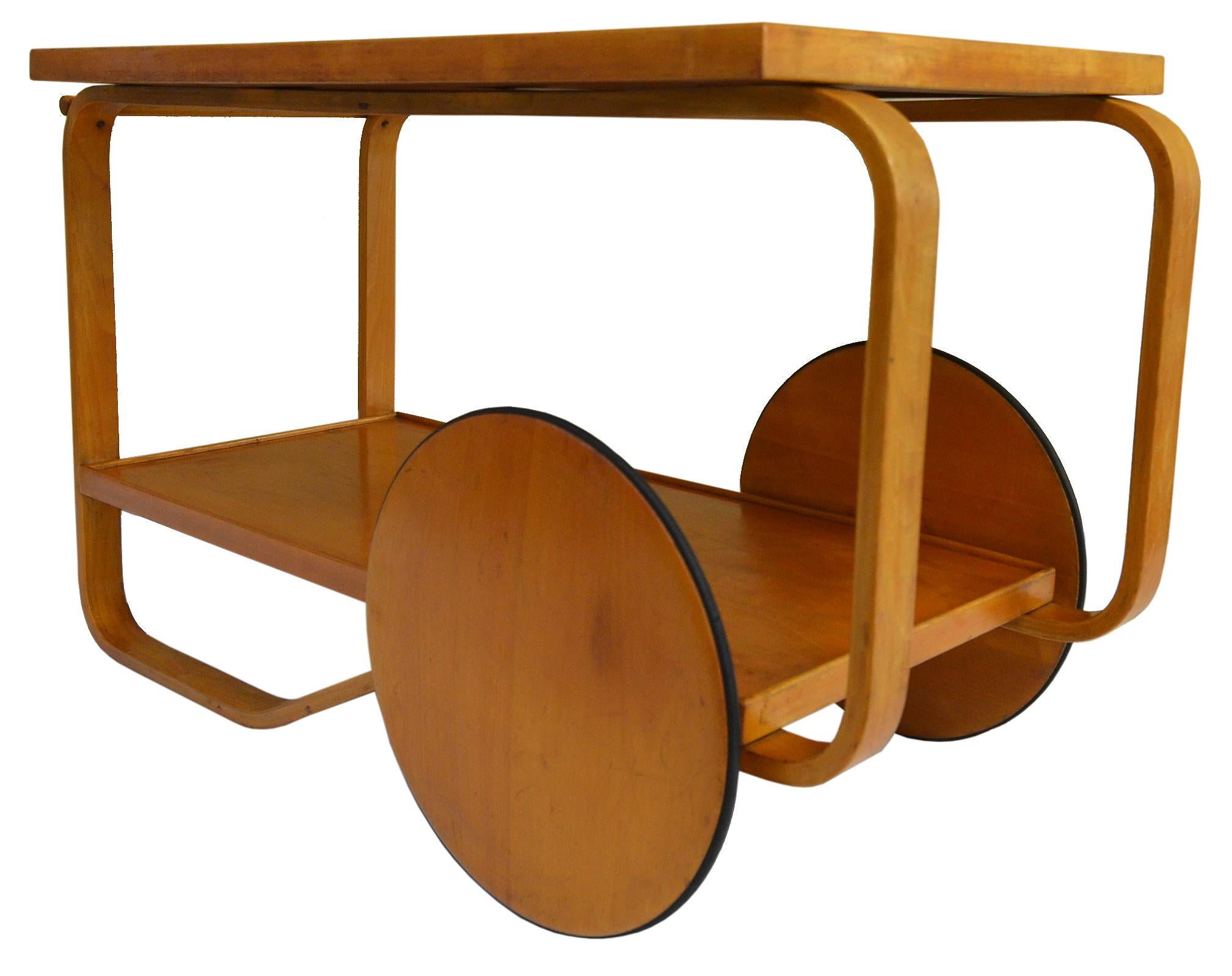 An exception untouched and very early Rolling Cart designed by Alvar Aalto. 

This is an incredible example of one of Alvar Aalto's most iconic designs. 
Manufactured by Finmar and retains the label by the maker. The retailer tag is also intact