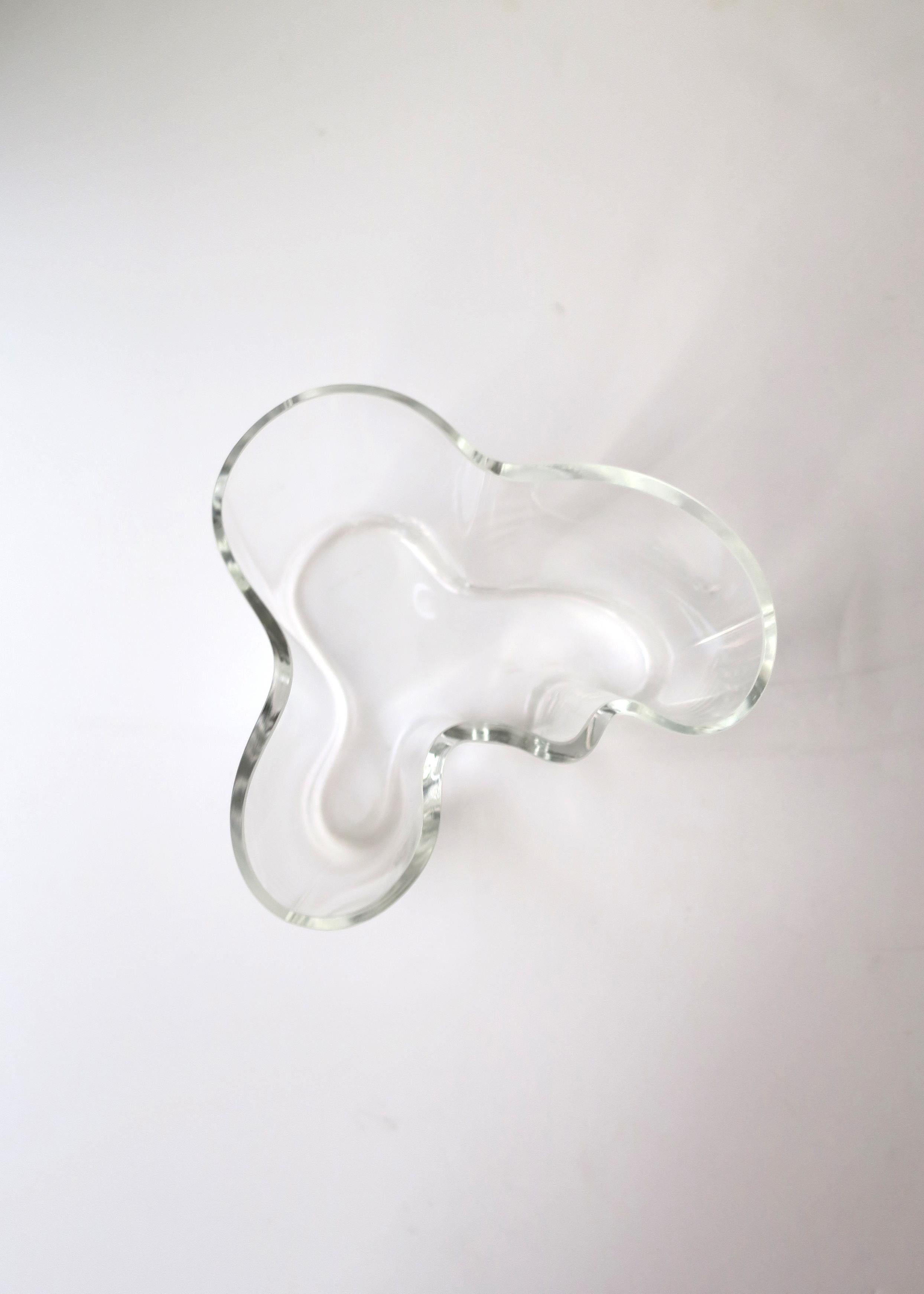 The beautiful and iconic Scandinavian Modern Alvar Aalto glass vase, aka as the 'Savoy' vase, created by designer Alvar Aalto, 1937, Finland. This clear vase, with original design by Alvar Aalto, for Finish company Iittala, is late-20th century,