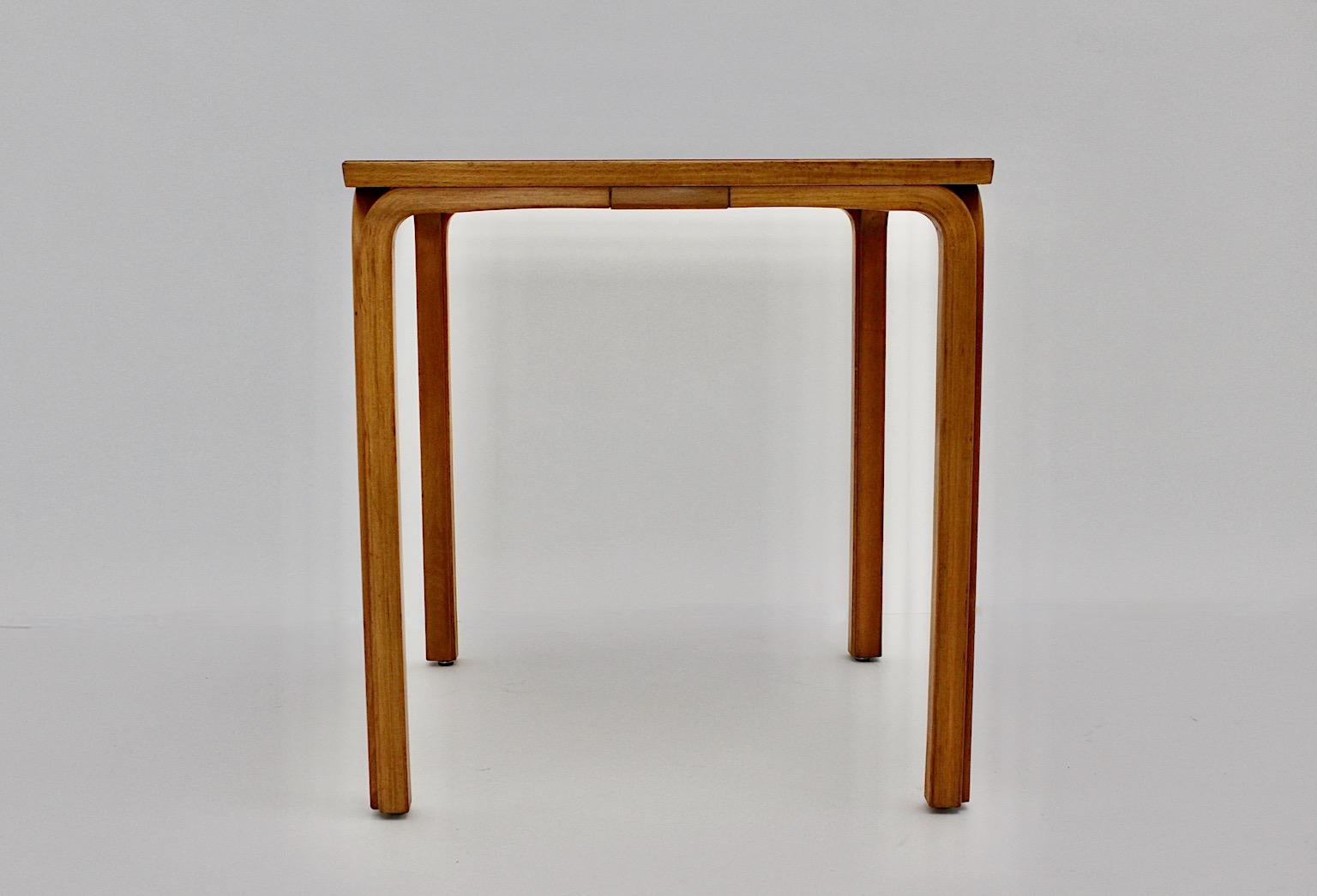 Scandinavian Modern vintage square like form side table from plywood and birch dining table or side table by Alvar Aalto designed circa 1946 Finland manufactured circa 1960.
A wonderful squared dining table or side table from birch while the Y leg