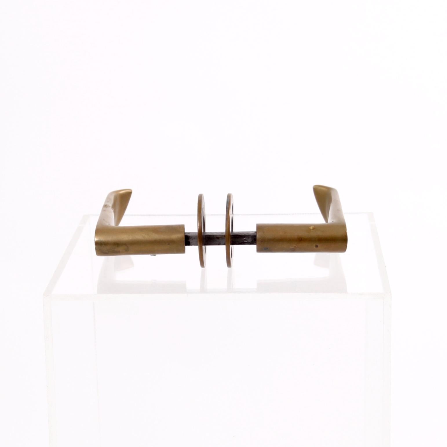 A collection of eight sculptural Alvar Aalto door handles.

The handles are designed in the 1950s and made of solid brass. 

They are in excellent condition with patina.