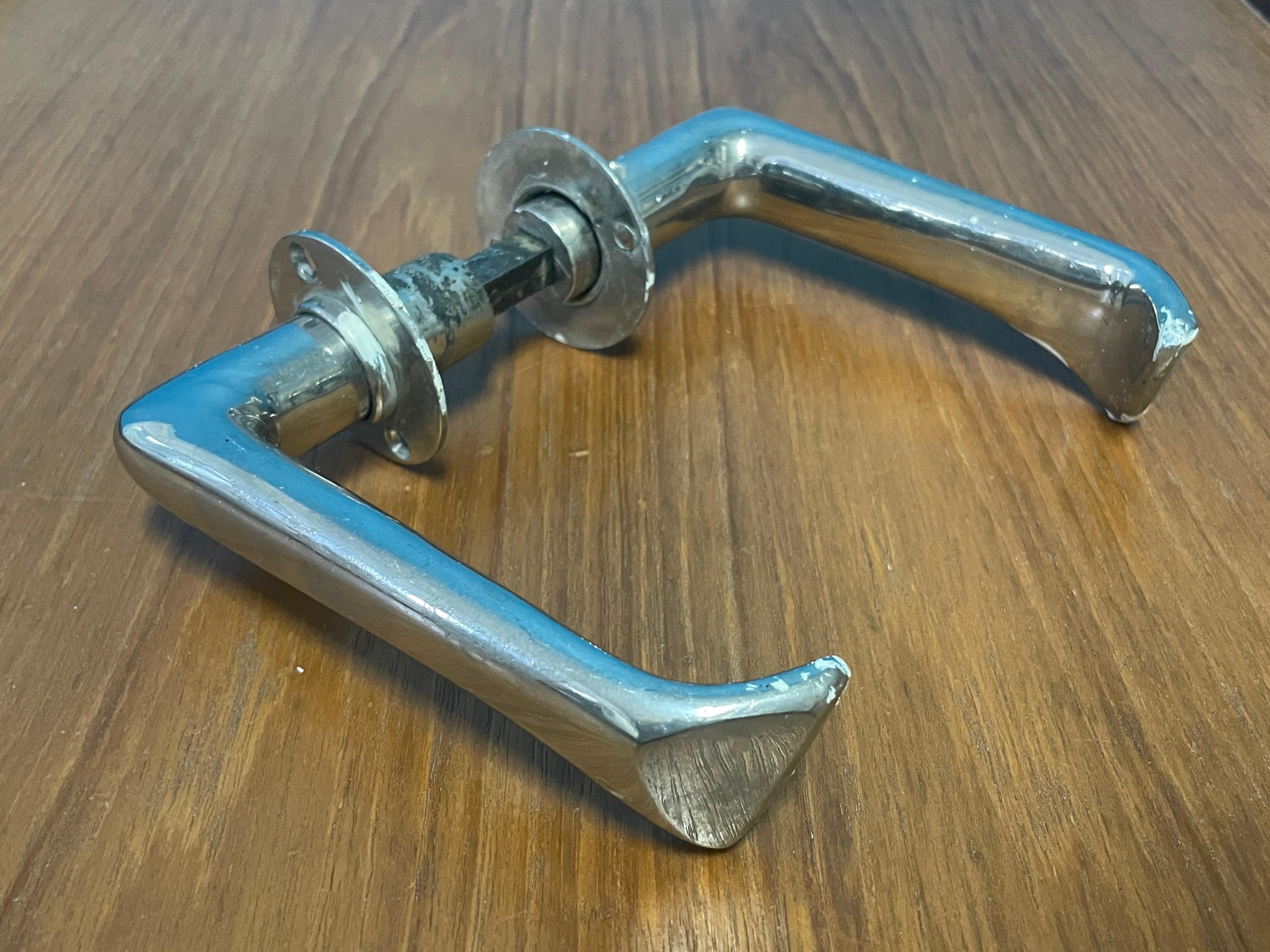 Sculptural Door Handles designed by Alvar Aalto in 1950s. Made in Finland.

Materials: Nickel-plated Brass.

Includes two handles and spacer. No screws.

Rarely for sale.