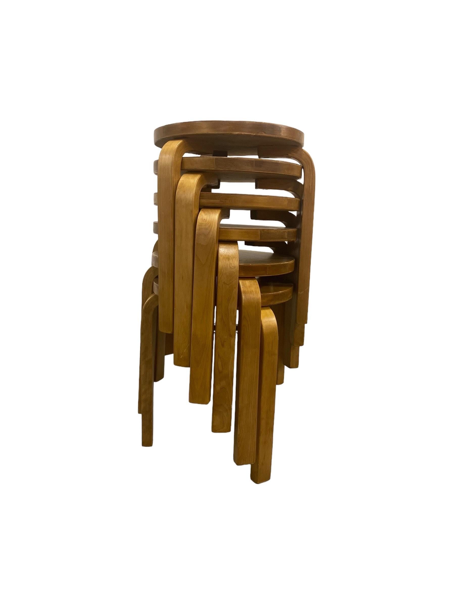 A set of the iconic model 60 stools designed by Alvar Aalto for Artek. Inspired by the clean lines and organic forms of nature, the Alvar Aalto Model 60 Stool is a timeless piece of furniture that seamlessly blends functionality with Scandinavian