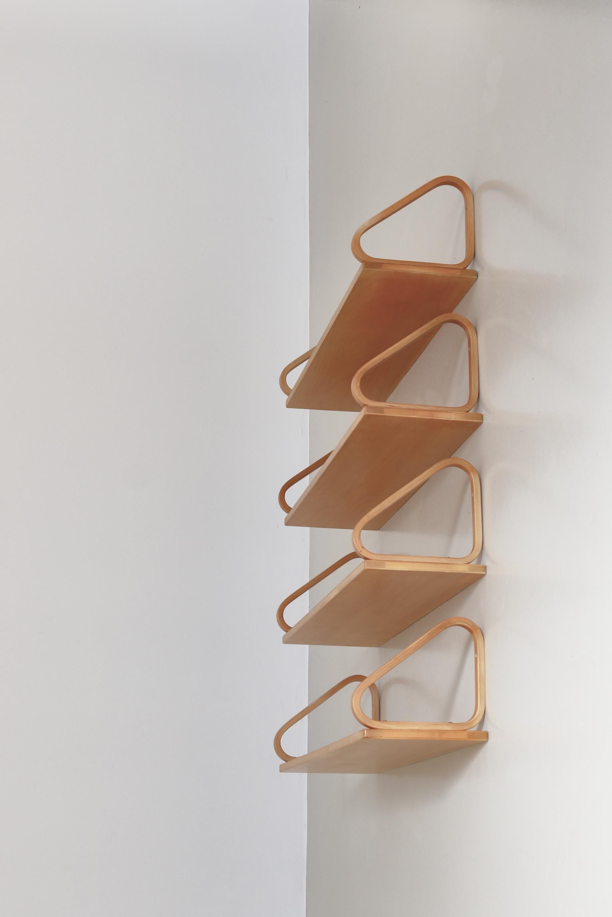 Set of 4 early Alvar Aalto wall shelves model 
