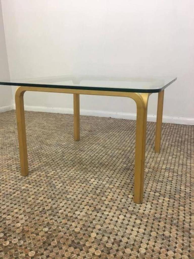 Alvar Aalto side/ coffee table with glass top and steam-bent birch base features Aalto's signature Y-shaped leg. Classical and iconic.

Designed by Alvar Aalto in 1946 and produced by Artek, circa 1970s.

Would look fantastic in any modern