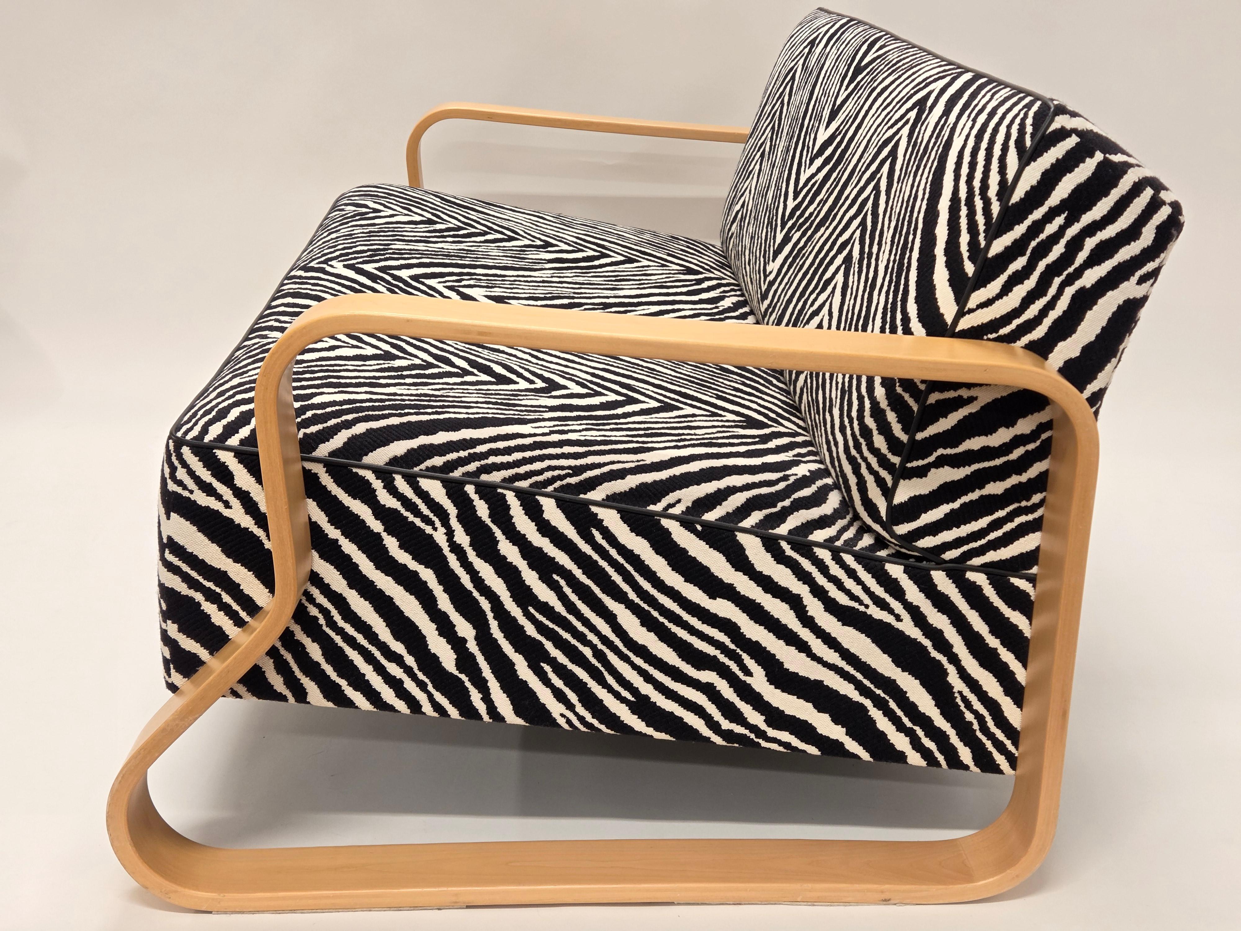Sofa model 544, designed by Alvar Aalto and manufactured by Artek. The sofa has been made of birch, and it has famous Artek's Zebra fabric upholstery. 