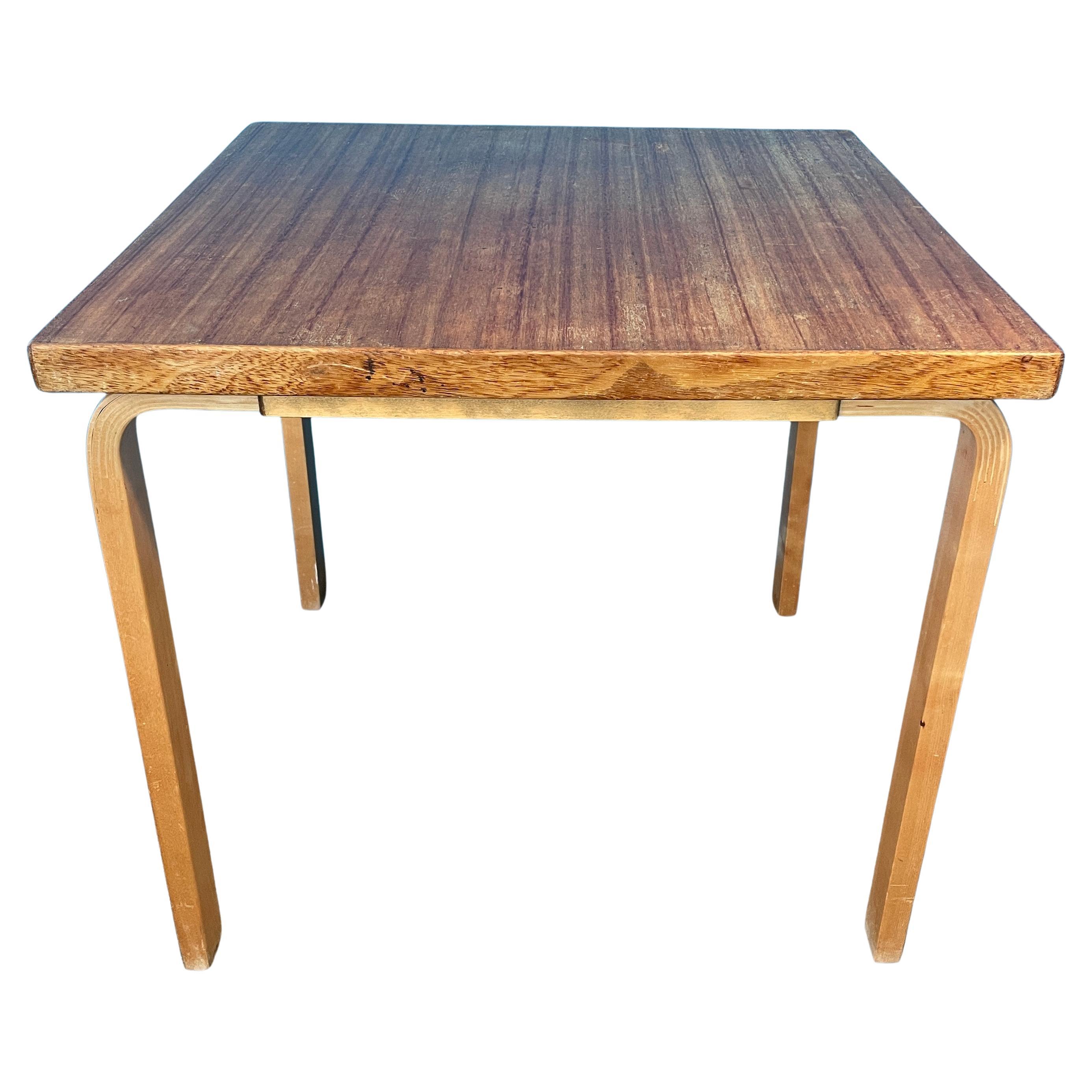 Table model 81C is Alvar Aalto's timeless design from 1935. This table was produced in the 1950s. 
Table is completely original.

- Height: 27.5in / 69,5cm
- Width and Depth 30in / 76cm

Table top is stained birch / birch-plywood and legs are