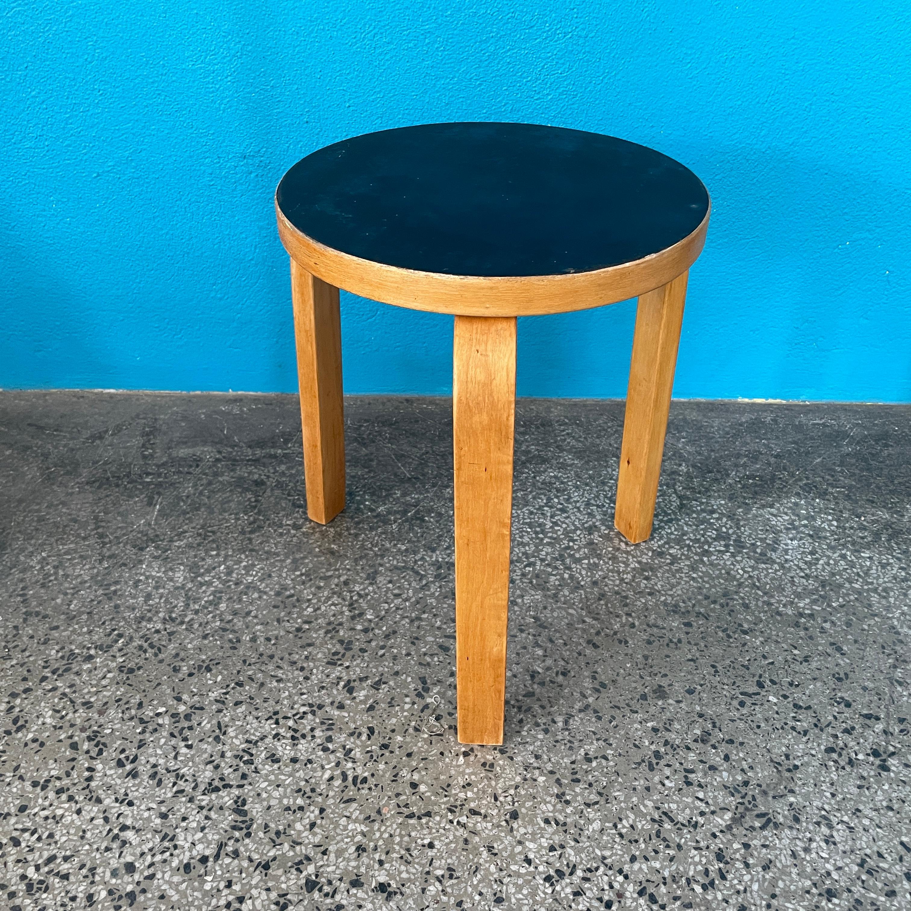 Iconic Aalto three-legged stool. Stool 60 was officially unveiled to an enthusiastic public in London at a Finnish furniture review in November 1933.

This Stool is Original vintage version of stool from early 1950´s. Lot of wear of use, stool is in