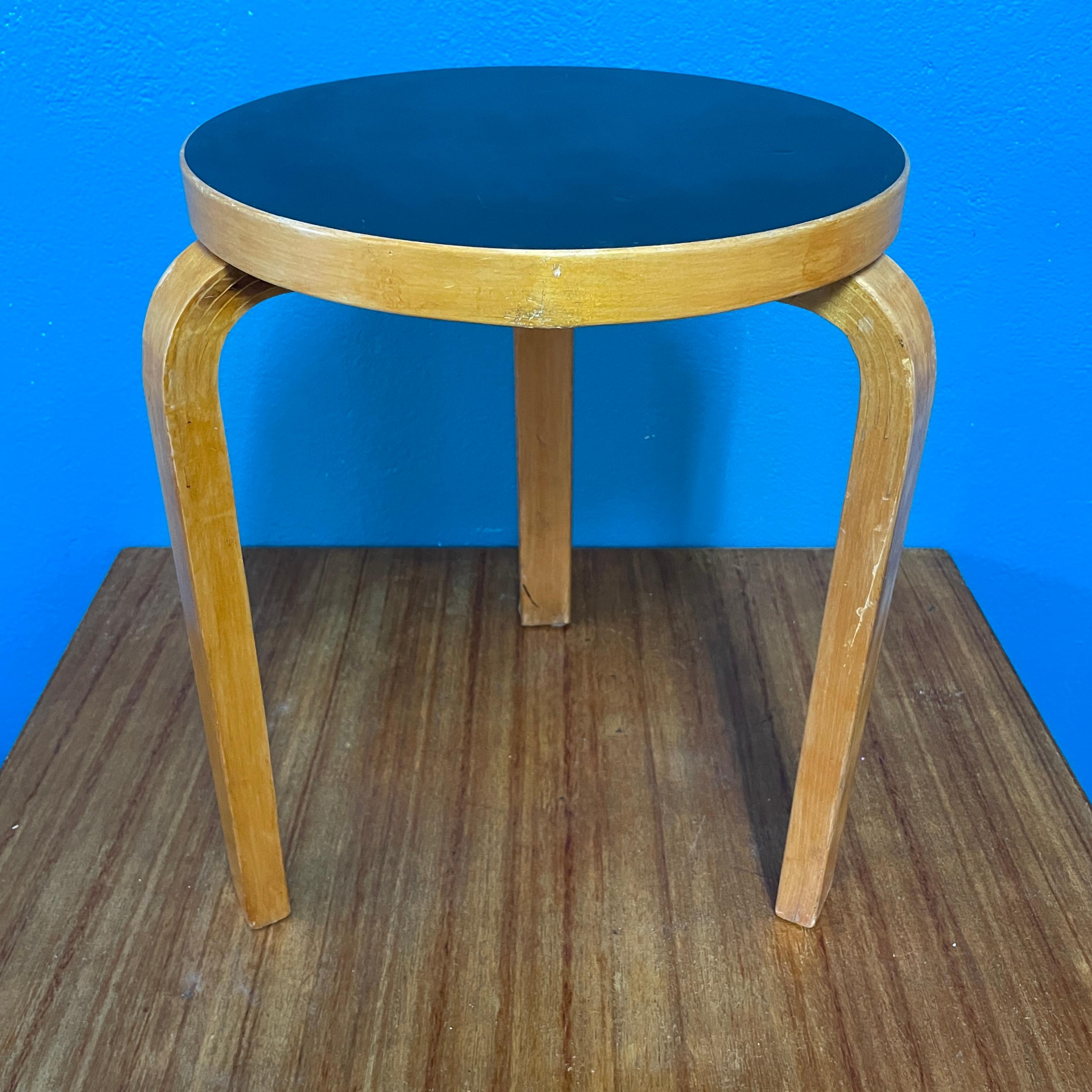 Iconic Aalto three-legged stool. Stool 60 was officially unveiled to an enthusiastic public in London at a Finnish furniture review in November 1933.

This Stool is Original vintage version of stool from early 1950´s. Lot of wear of use, but the