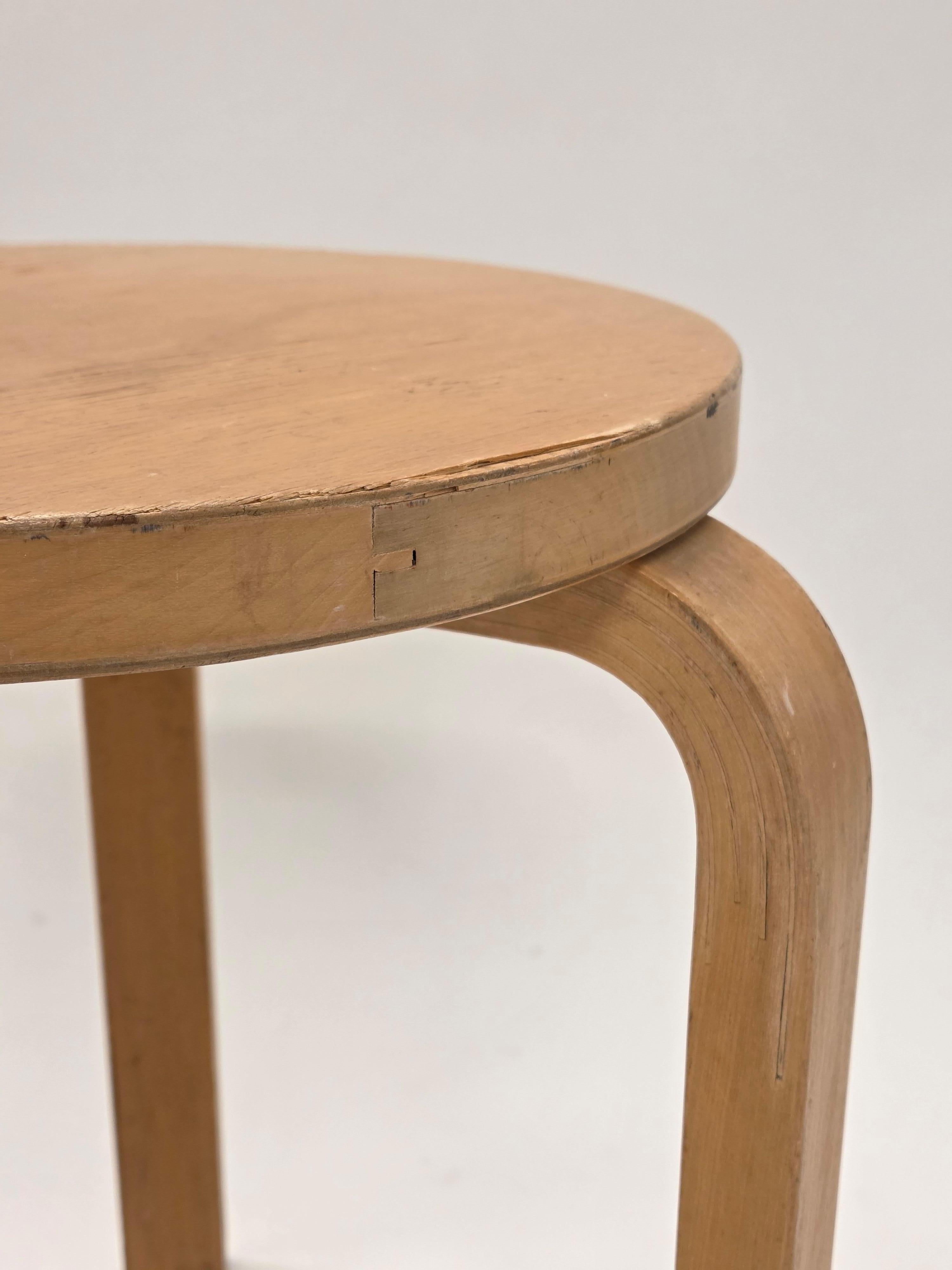 Artek 60 stool, designed by Alvar Aalto. In good used condition, and beautiful patina of age. The stool is from 1960s. It has finger-joints and slotted screws.

The Artek Stool 60, designed by Alvar Aalto in 1933, is one of the most iconic pieces of