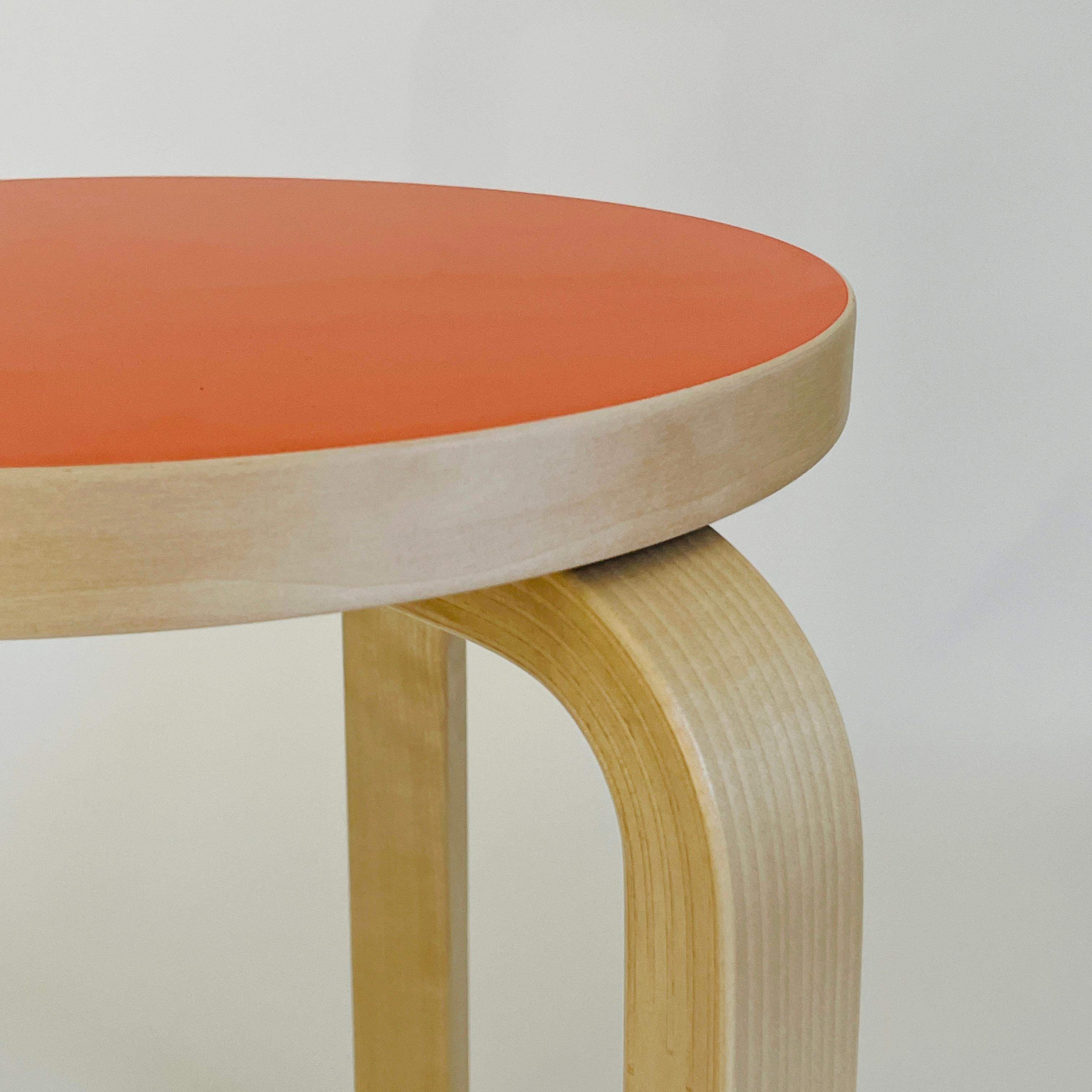 Finnish Alvar Aalto Stool 60, Special Orange Color Top, Artek Finland.