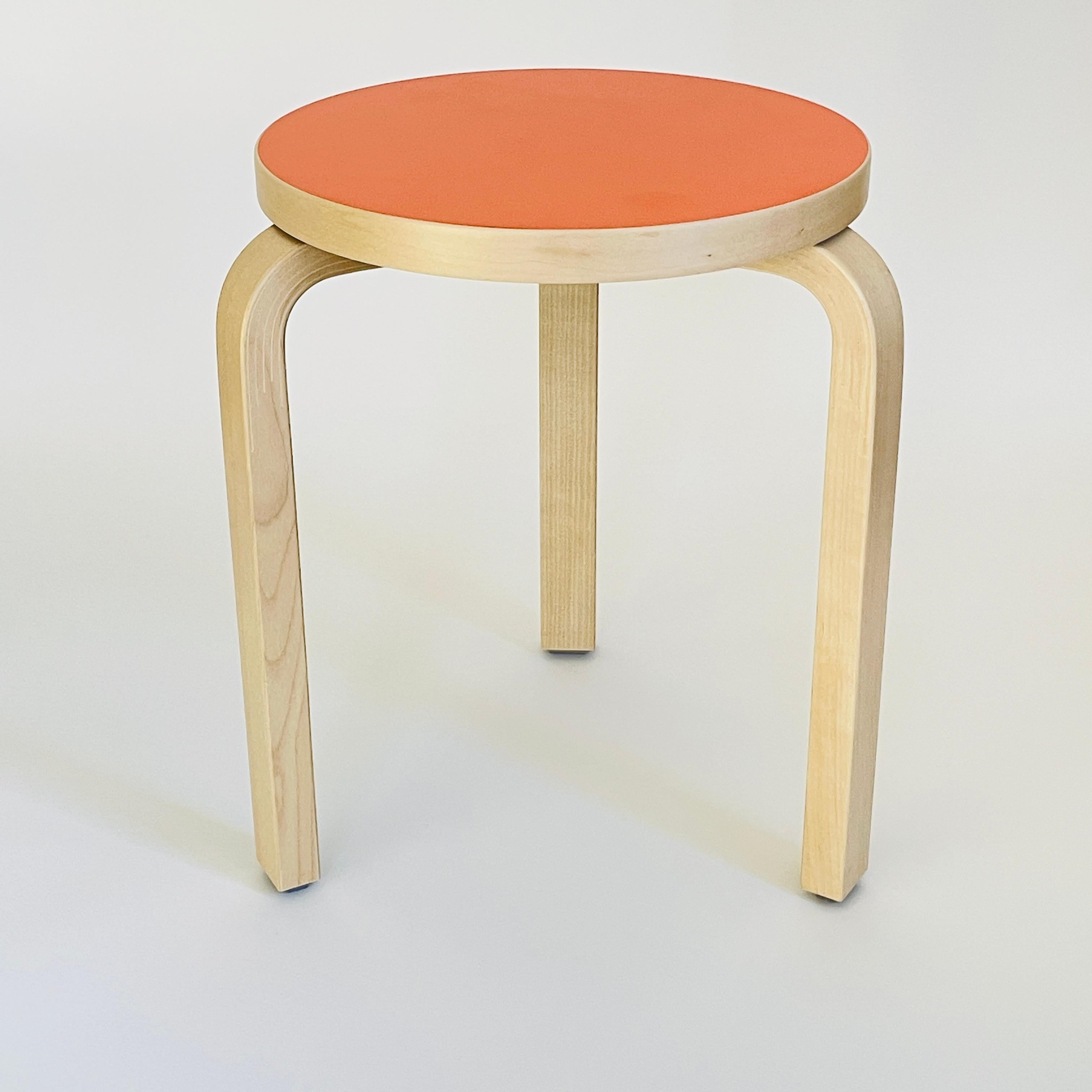 Contemporary Alvar Aalto Stool 60, Special Orange Color Top, Artek Finland.