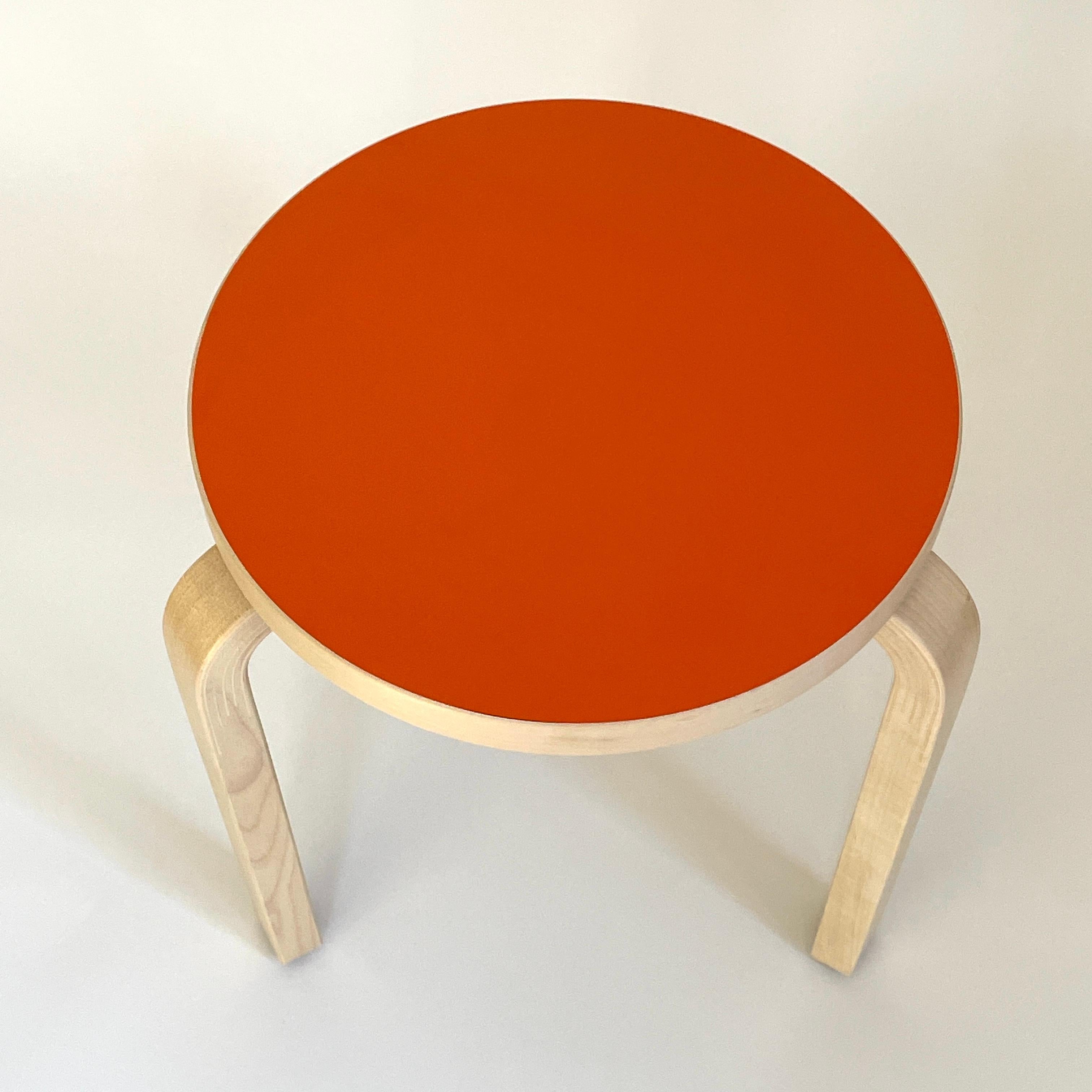Birch Alvar Aalto Stool 60, Special Orange Color Top, Artek Finland.