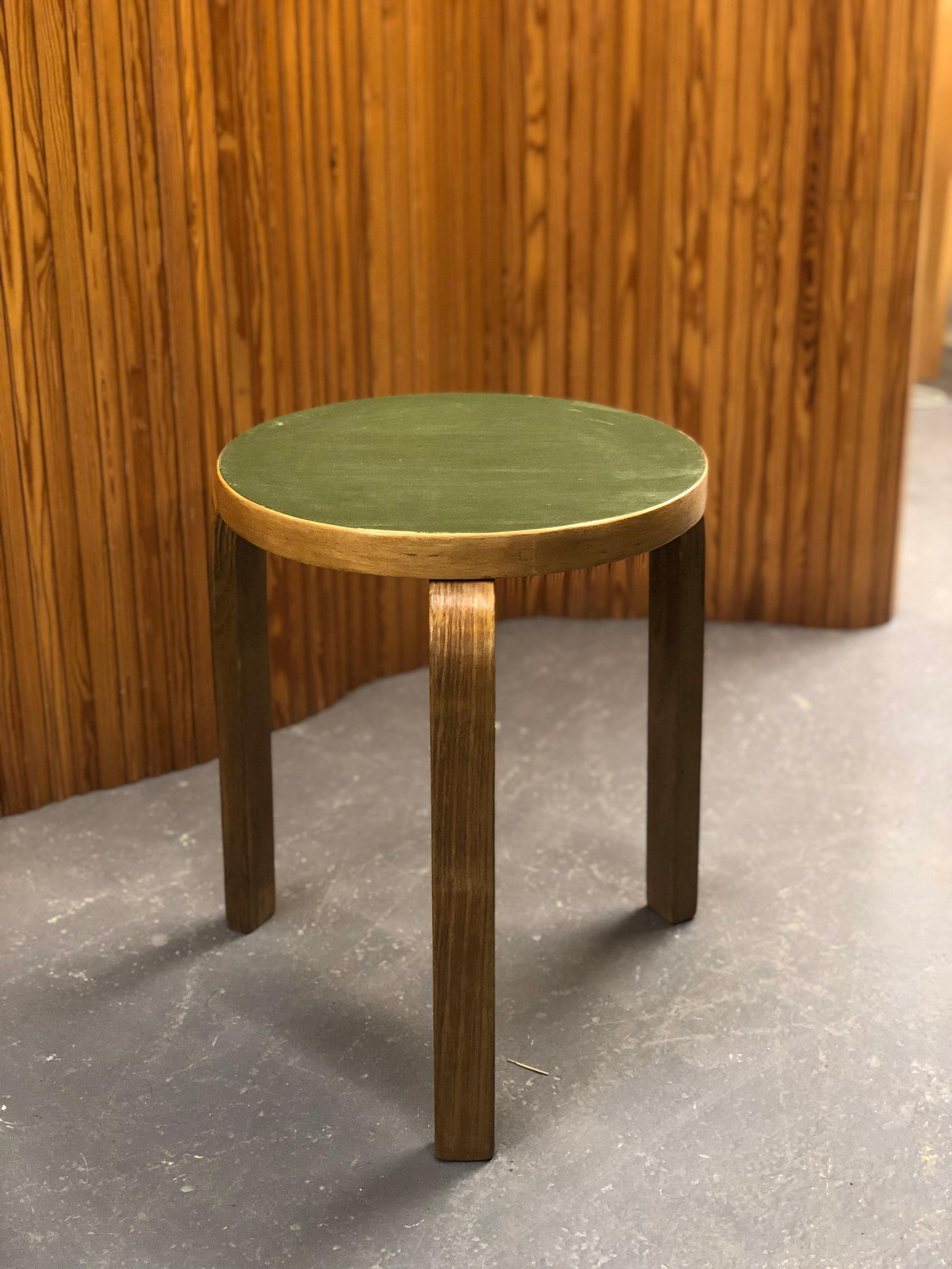 Artek stool in birch and green linoleum, designed by Alvar Aalto and manufactured by Artek in the 1950s. The model 60 stool is perhaps the most well known Aalto design and has always been attractive to people. As with a lot of Alvar Aalto's works
