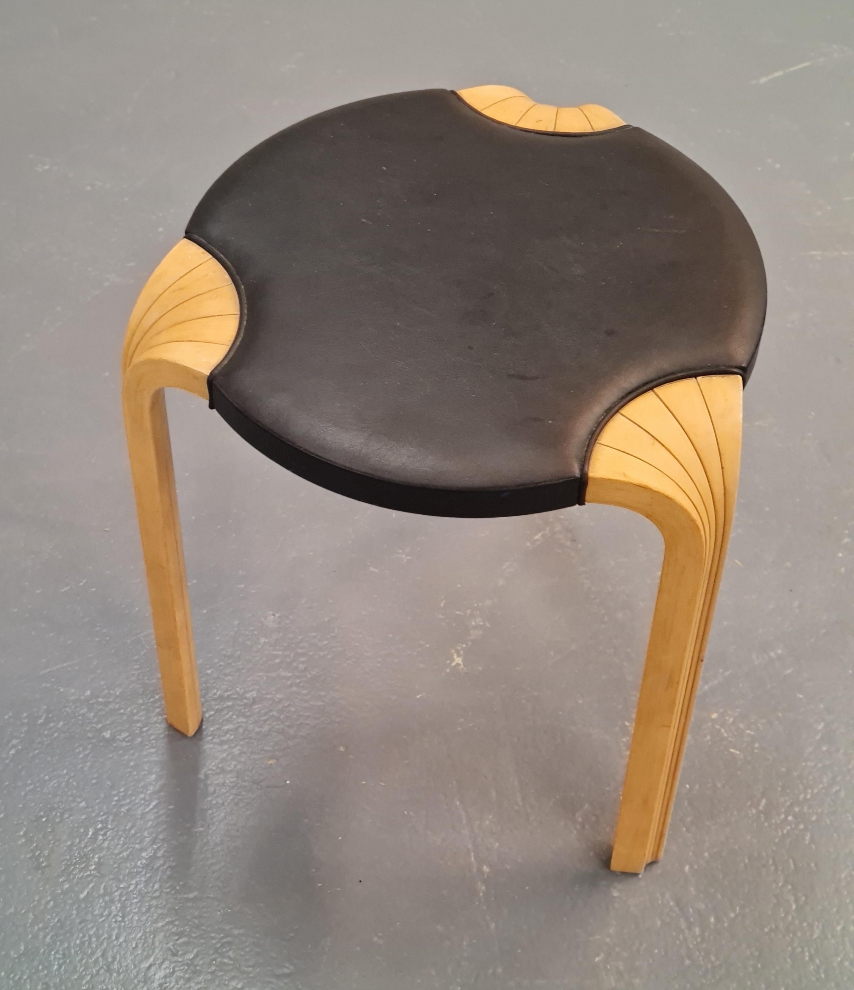 Even though simple, this stool comes with great quality and attention to details. The less common X-leg with the leather padding bring plain beauty. This stool is in good condition with some signs of usage.