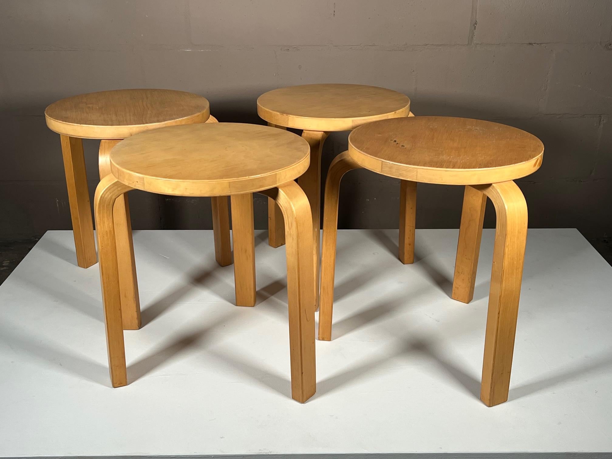 A great set of four (4) stools by Alvar Aalto made in Finland and distributed by ICF, NYC. The stacking stools have a wonderful patina and original finish.