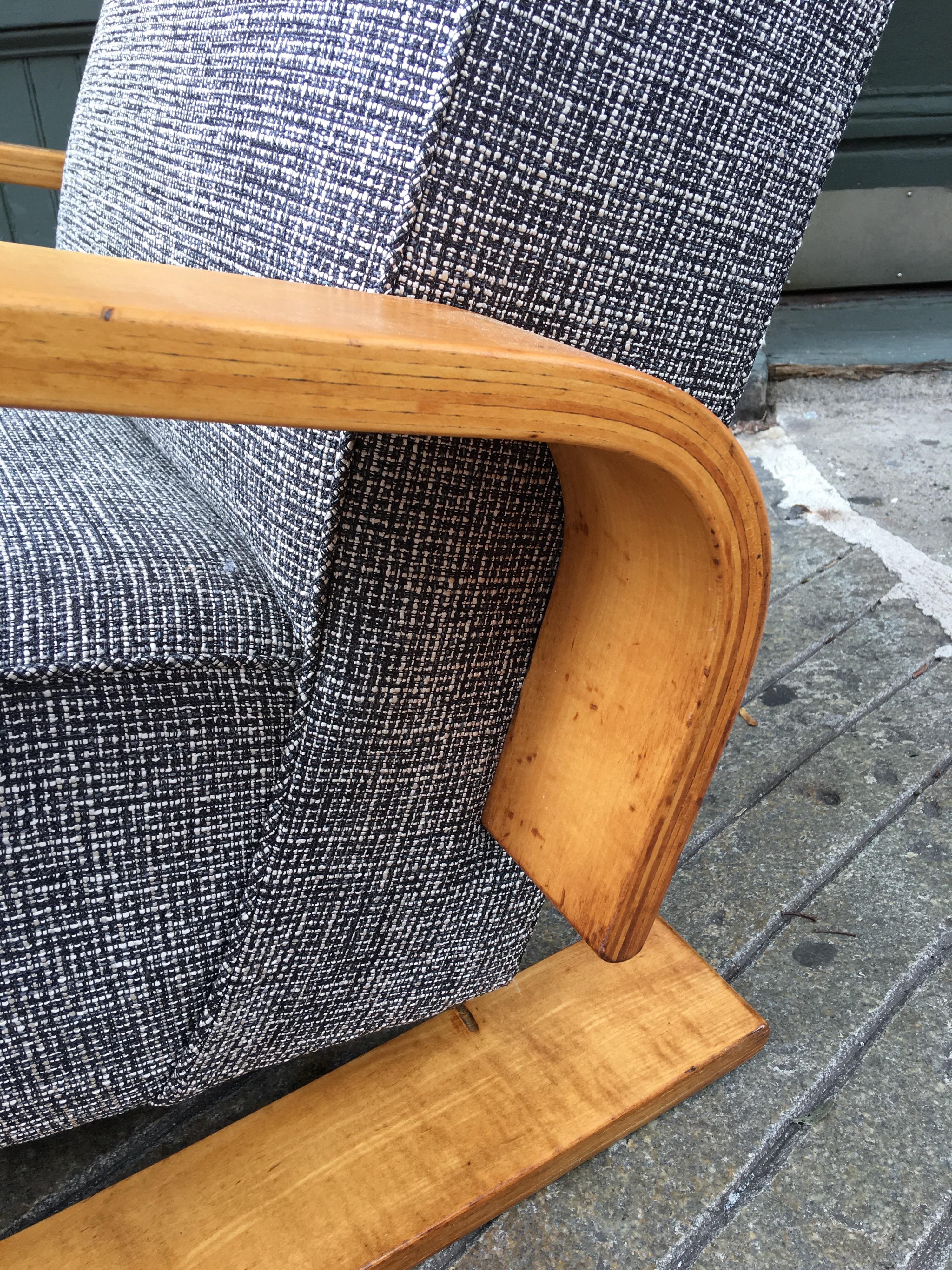 Alvar Aalto tank chair for artek in new fabric with birch bentwood arms refinished .