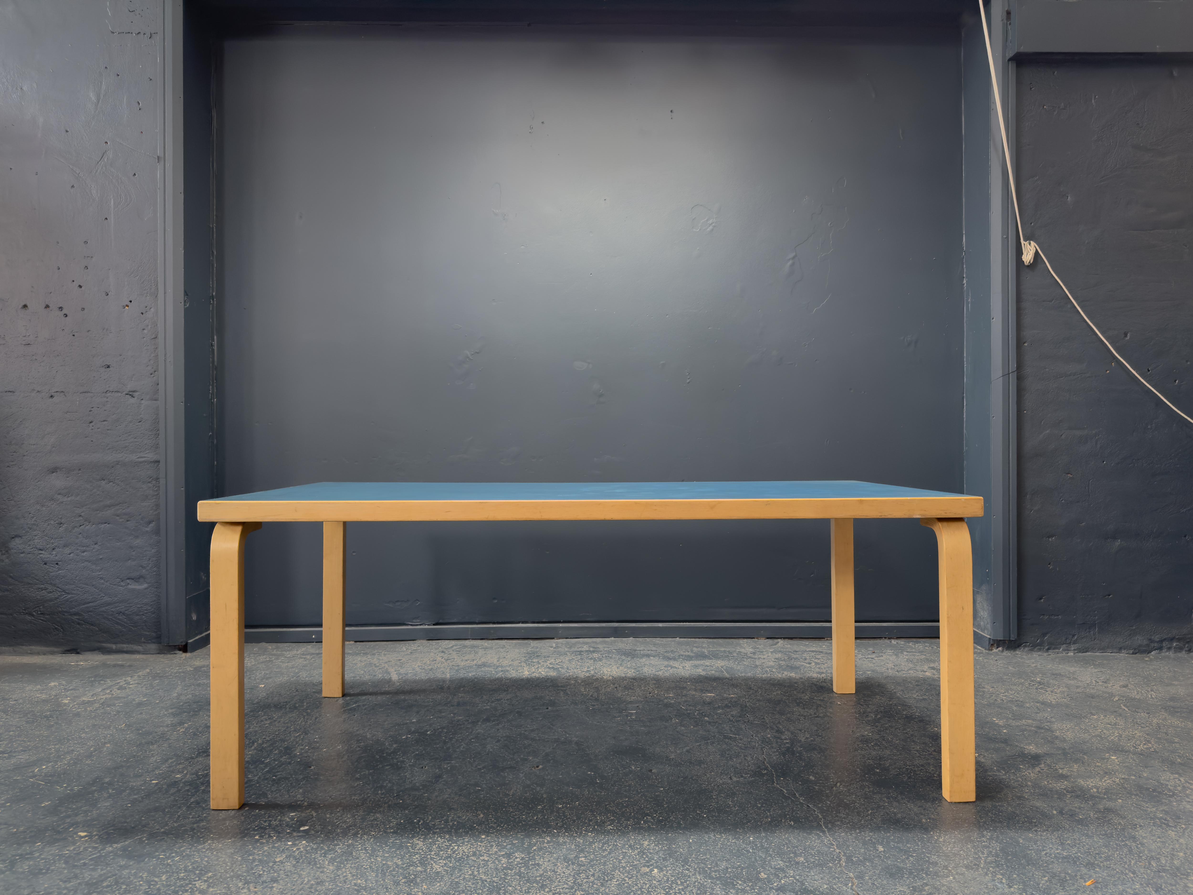 This striking table by Alvar Aalto exemplifies the Finnish master's signature blend of functional modernism and organic warmth. Designed with Aalto's characteristic focus on human-centered utility and visual clarity, the table features his iconic