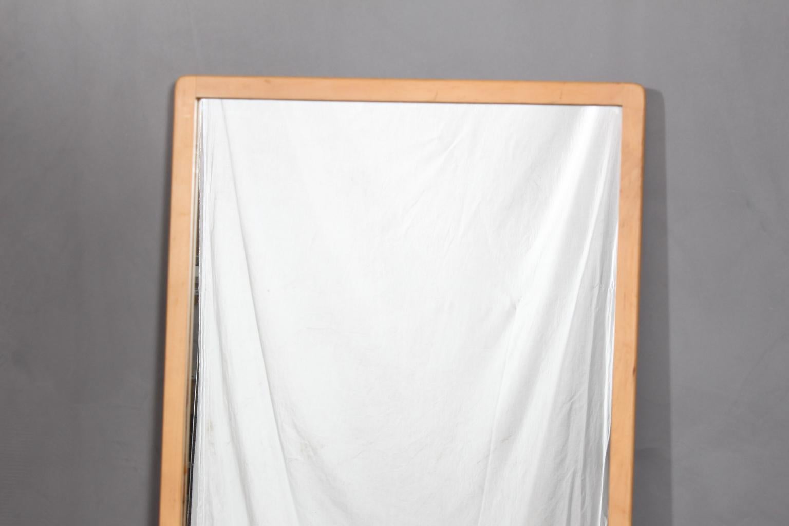 Alvar Aalto wall mirror with frame of birch.