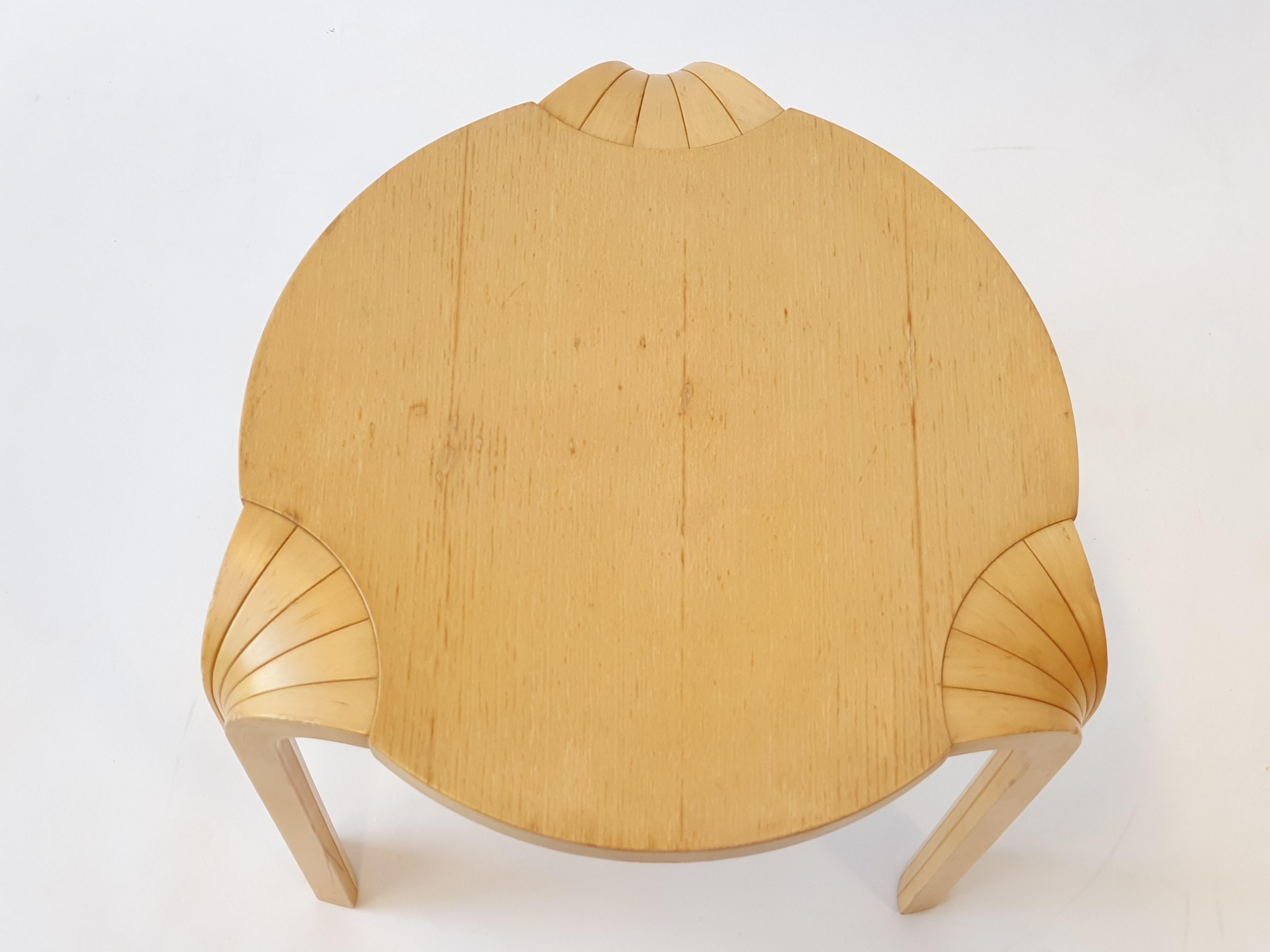 Artek X600 stool by Alvar Aalto, birch and ash, in very good used condition.

The Artek X600 Stool is designed by Alvar Aalto in 1954. The stool features solid wood construction. Aalto's signature design for the X600 stool includes its distinctive