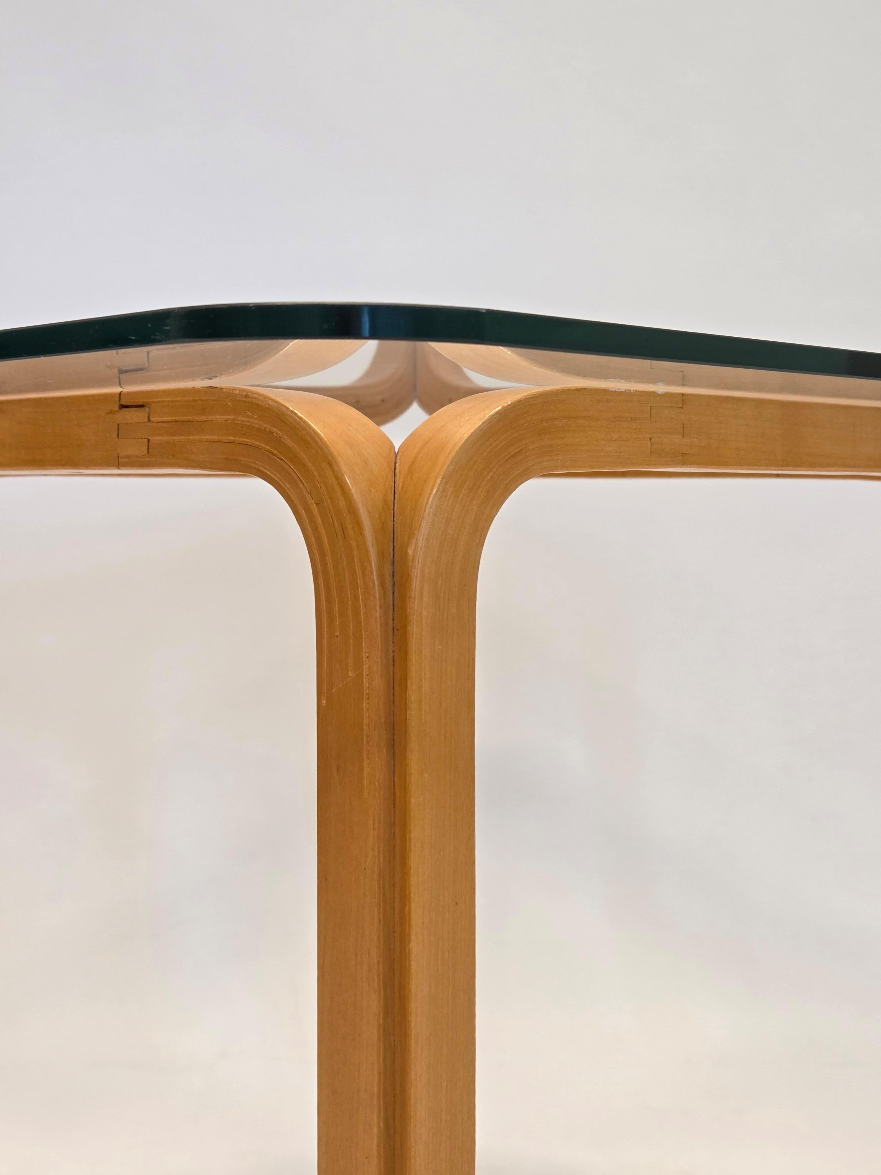 Artek Y805C glass table, designed by Alvar Aalto. The table is old, probably from the 1950s, and shows the old joints. Good used condition and a wonderful patina. 