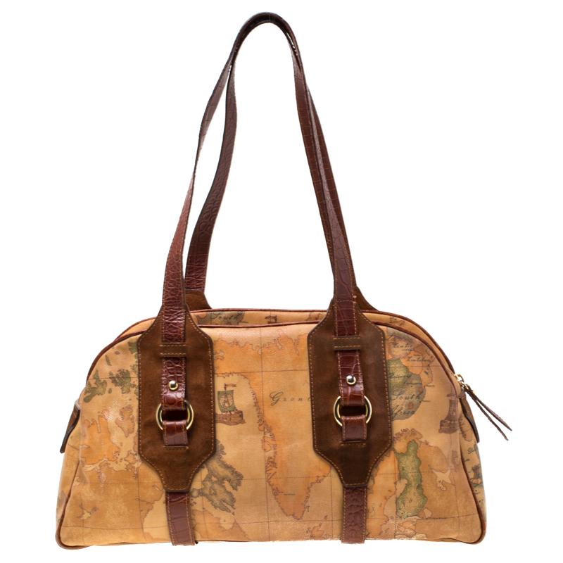 This satchel from Alviero Martini 1A Classe will give you days of style and ease. It is crafted from geo print canvas and leather. It is equipped with a spacious nylon interior, two handles and gold-tone hardware.

Includes: Original Dustbag

