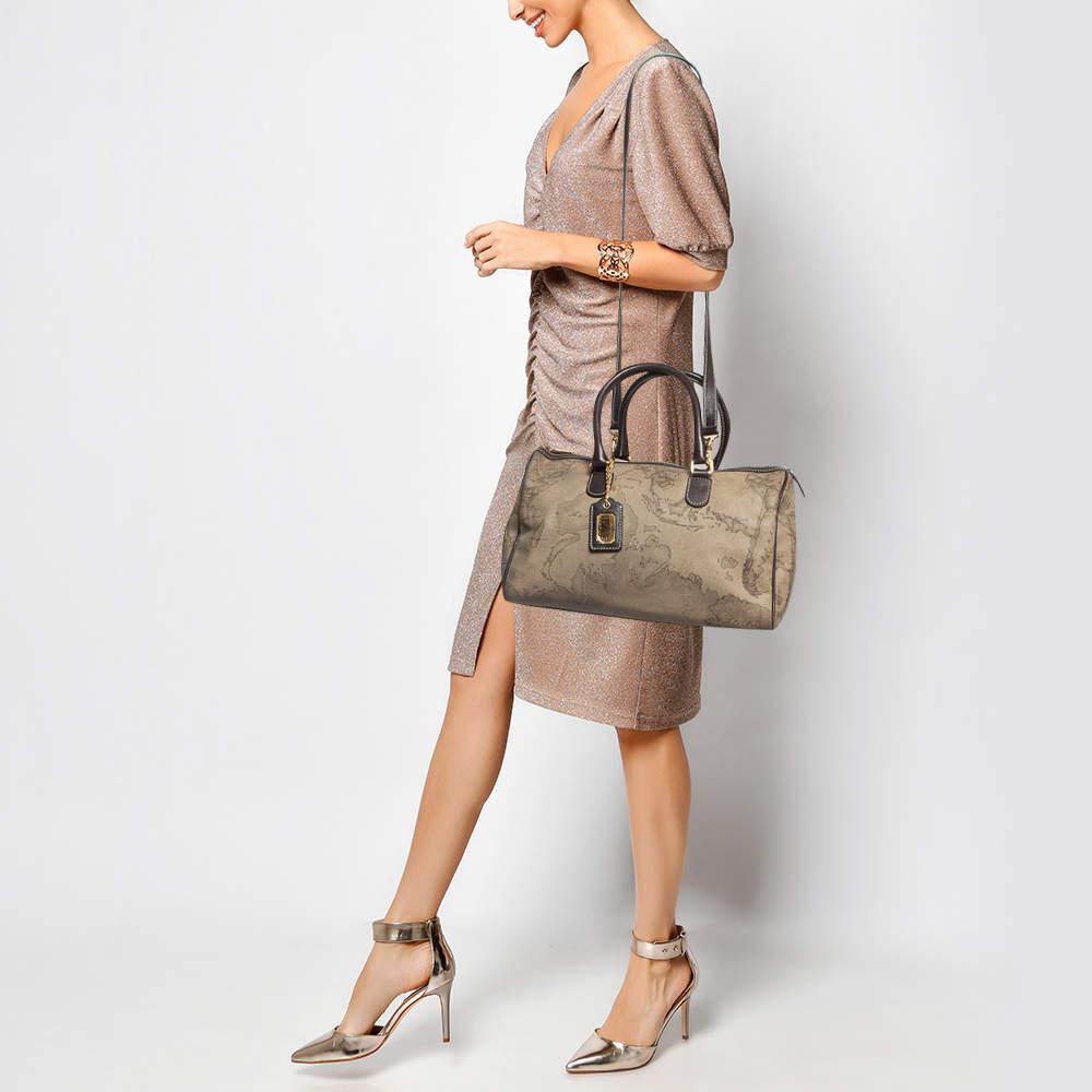 This authentic designer satchel is rendered in the finest quality materials into an elegant design. Versatile and functional this carryall is well sized for your daily use.