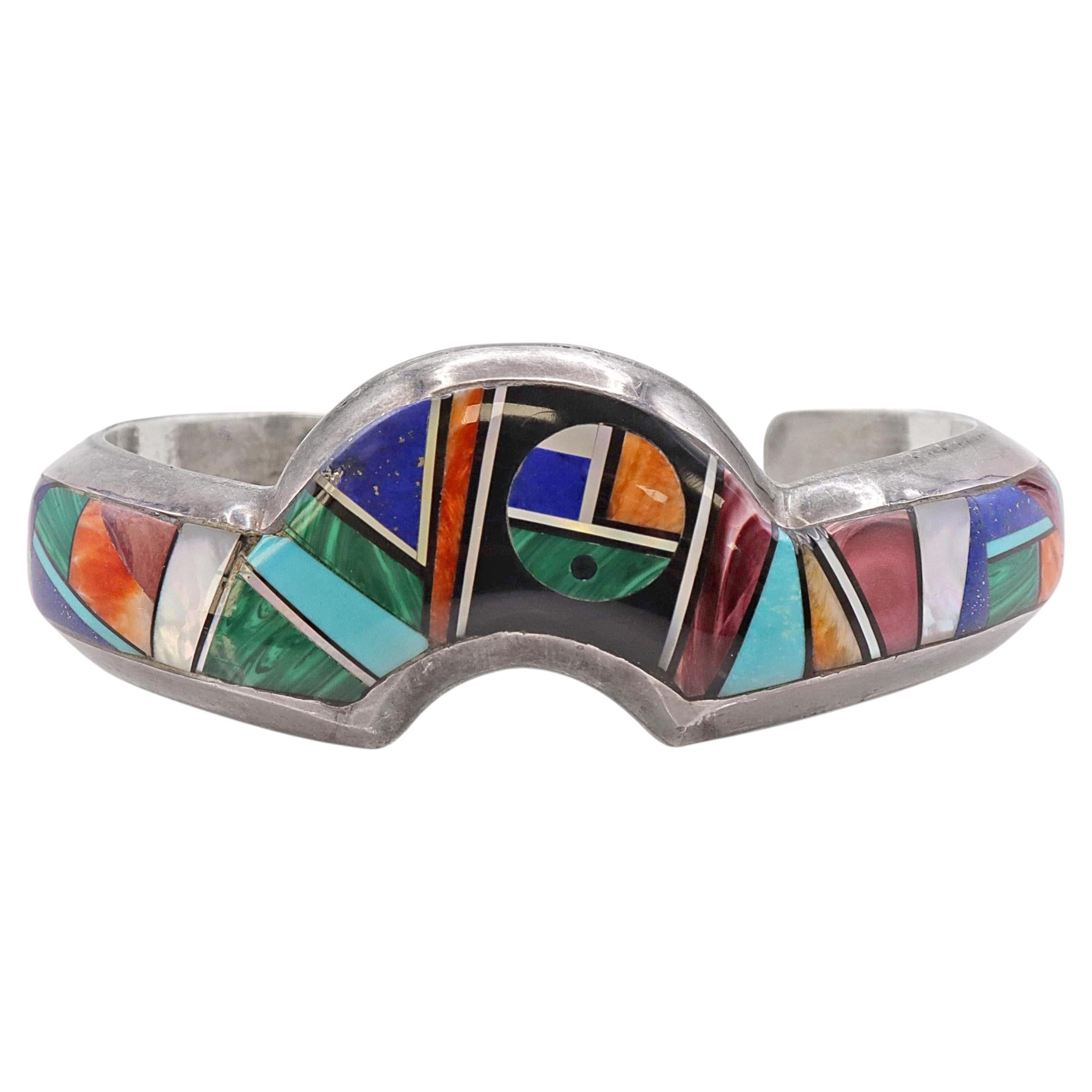 Pulsera tipo brazalete de plata de ley con incrustaciones de varias piedras, de Alvin Yellowhorse (navajo)