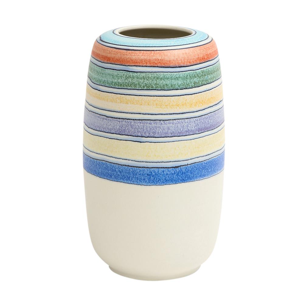 Bagni for Raymor, vase, ceramic, white, stripes, blue, yellow, signed. Tall chunky bisque vase decorated with bands of blue turquoise, burnt orange, yellow and two shades of blue on the upper half of the vase. Retains faded Raymor paper label on the