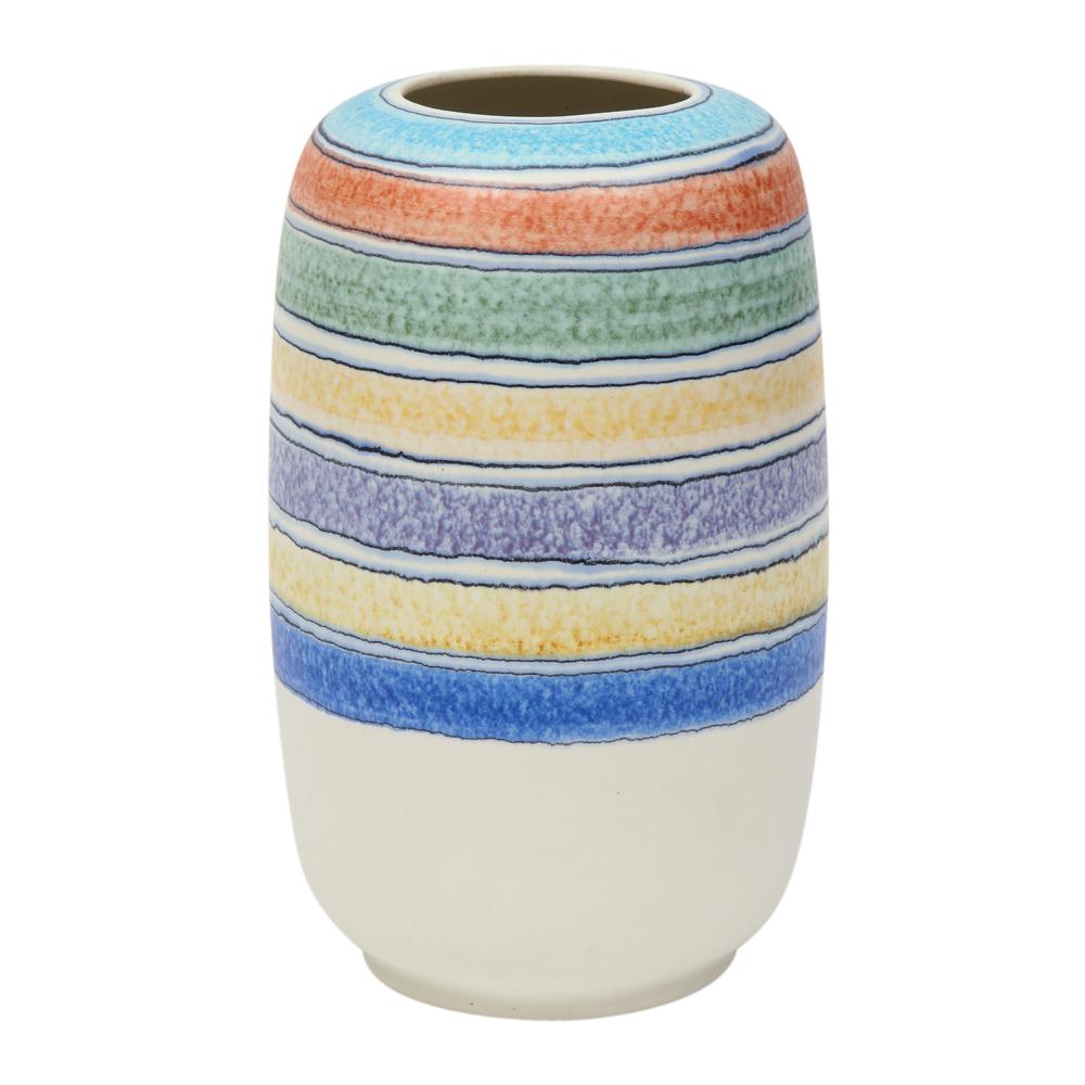 Alvino Bagni vase for Raymor, ceramic stripes, blue, yellow, white, signed. Chunky medium scale vase. Upper half of the vase has bands of pastel colors: light sky blue, burnt orange, moss green, yellow and two hues of darker blue. Raymor label on