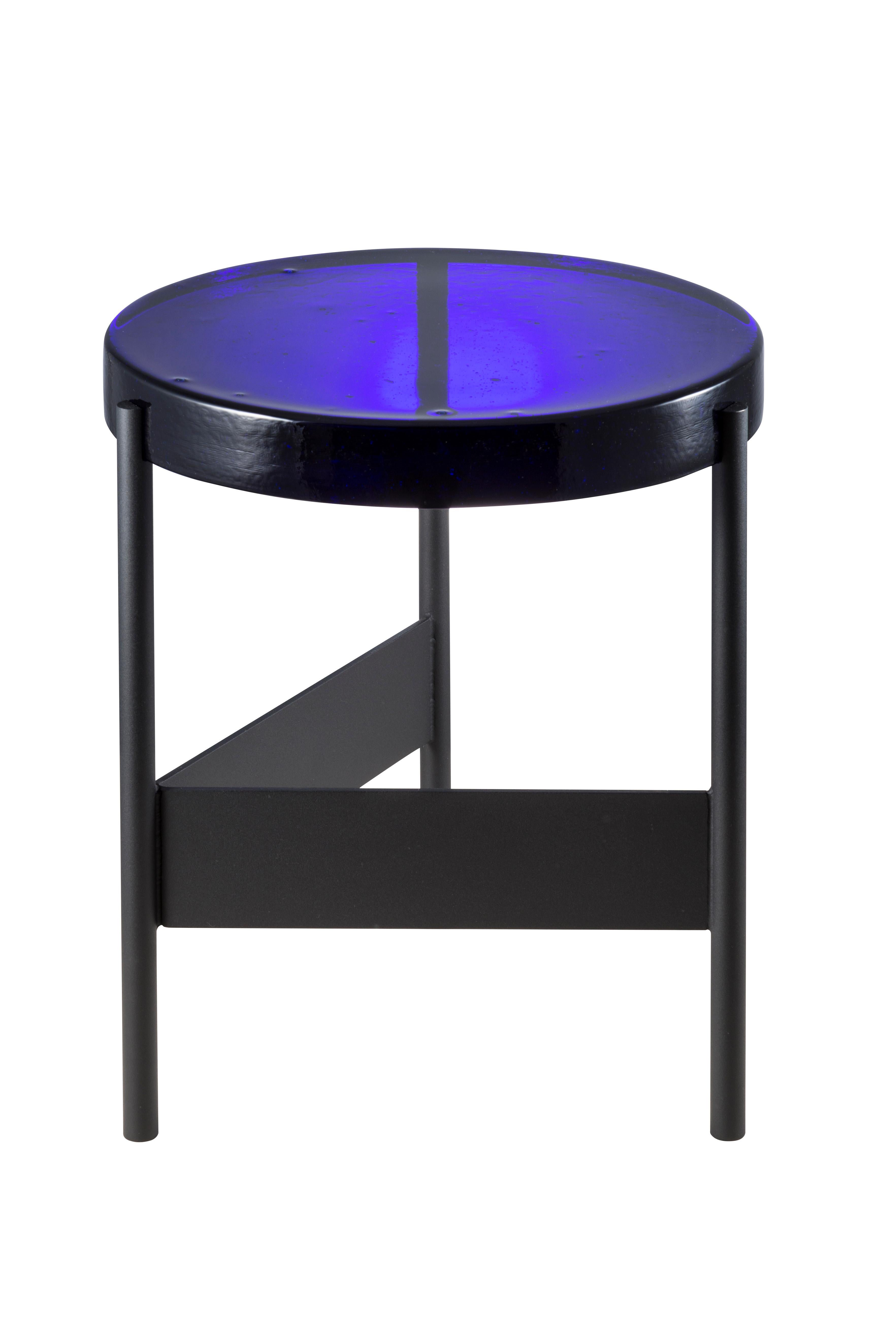 Alwa Two Blue Black Side Table by Pulpo
Dimensions: D38 x H44 cm
Materials: casted glass; powder coated steel 

Also available in different finishes. Please contact us.

Normally, glass is regarded as being lightweight with sharp edges. In contrast,