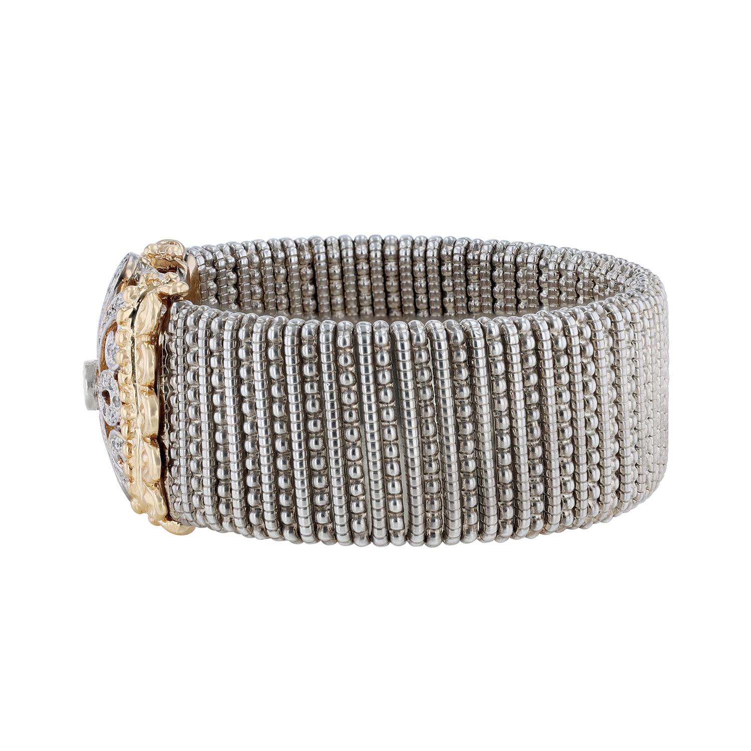 This cuff bracelet is made in sterling silver of Alwand Vahan trademark beading with 14K gold detail. With diamonds weighing 0.70 carats.
