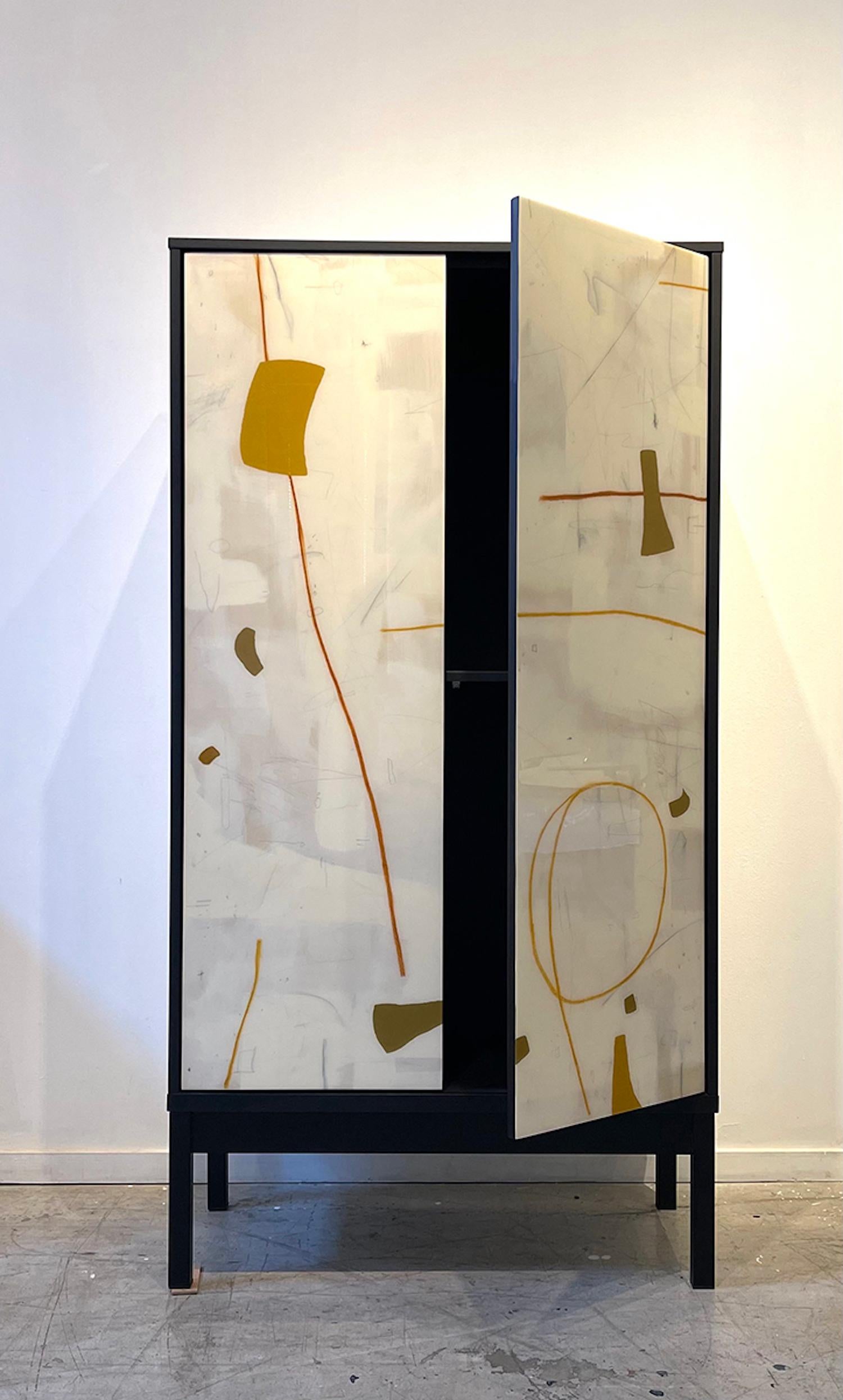 The Aly Armoire design is created by hand in our studio in Toronto, Canada.
The doors are handpainted by Murray Duncan, creating a unique and special cabinet each time.

The Aly Armoire is inspired by the abstract modern movement in artwork.  The