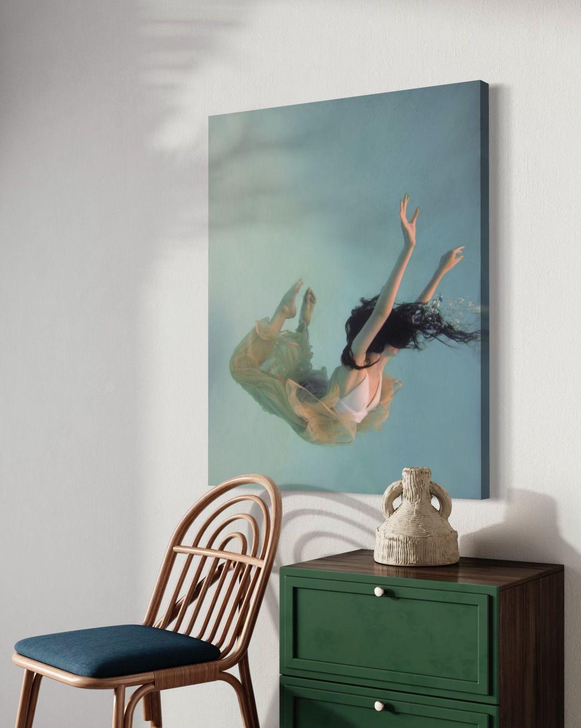 This contemporary figural limited edition art photograph by Alyssa Fortin is reminiscent of the angels that were often depicted in the Rococo style during the Baroque period. Rococo art was seen as more feminine, playful and often depicted scenes of