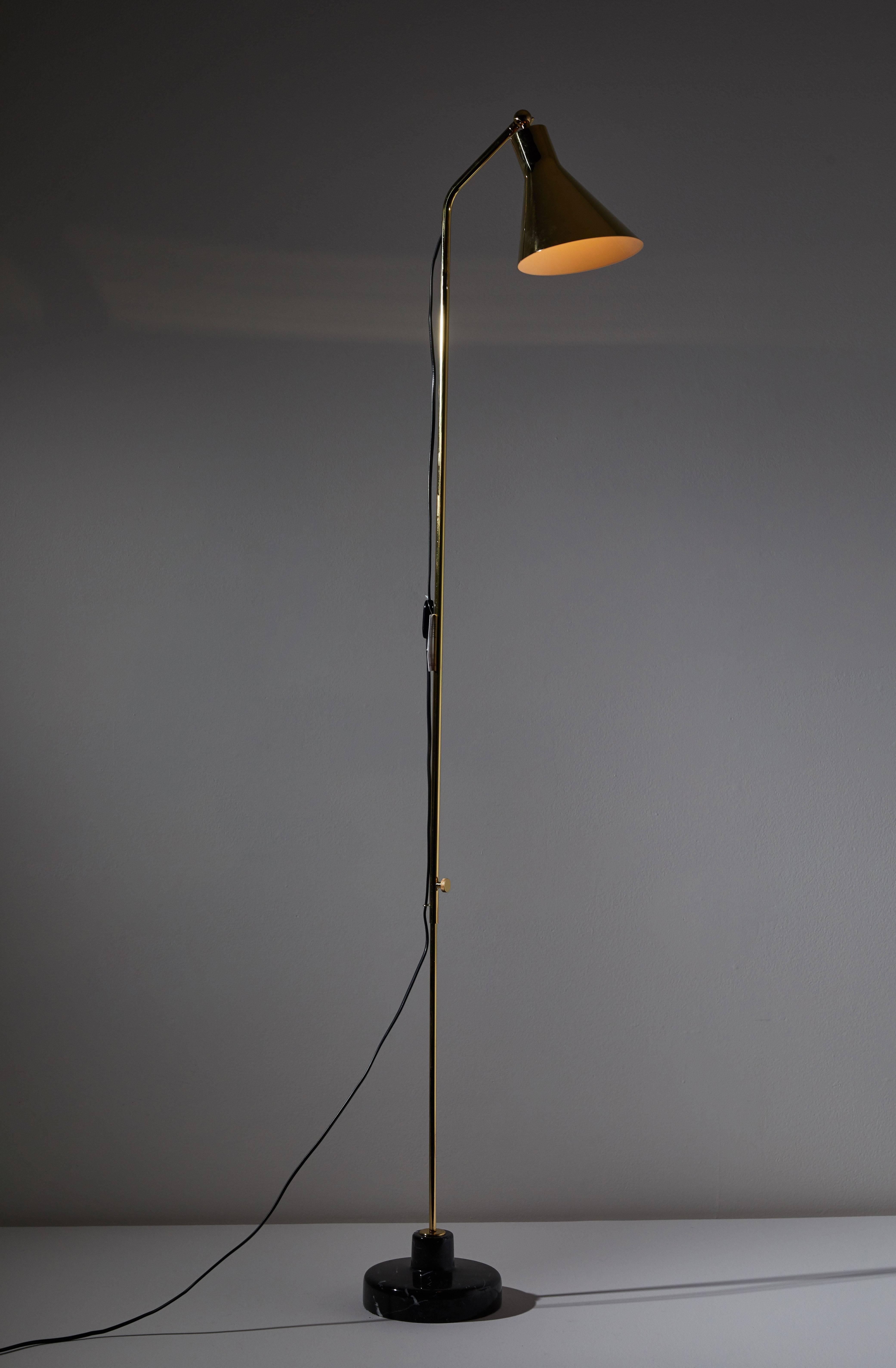 Alzabile floor lamp by Ignazio Gardella. Current production manufactured by TATO Italia. Brass with black marble base. Adjustable height and shade. Wired for US sockets.
Bulb type working voltage 110/240 V 1 x LED max 6W E27/E26 Class: II / IP