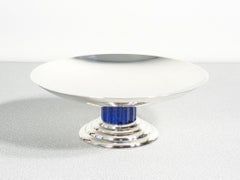 Art Deco-style silverplate riser, by PUIFORCAT Emile, with lacquered base
