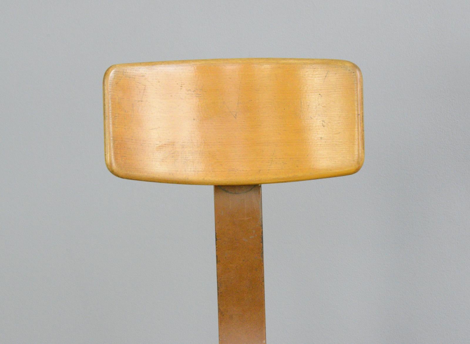 Ama Elastik factory chair, circa 1930s

- Sprung seat
- Height adjustable
- Shaped Ply seat
- Curved ply backrest
- Original maker decal on the backrest
- Made by Ama Elastik
- German, 1930s
- Measures: 40cm wide x 48cm deep x 93cm tall
-