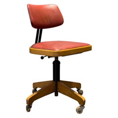 Ama Elastika Red Leather and Oak Swivel Chair