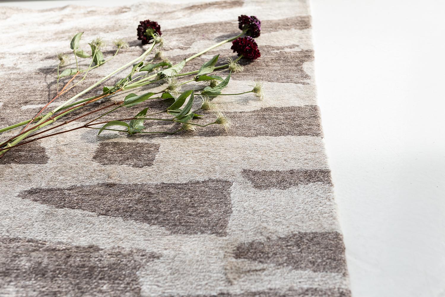 'Amabie’ is a phenomenal rug in Yokai Collection that features the impressive tones of taupe and ivory. It boasts these stacked bricks effect brought out by the brilliant design incorporated in this rug. This is a classic piece that gives any space