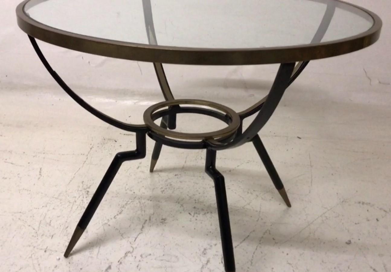 Amaizing Italian table.

Materials: iron, bronze and glass
If you want to live in the golden years, this is the coffe table that your project needs.
We have specialized in the sale of Art Deco and Art Nouveau and Vintage styles since 1982. If you