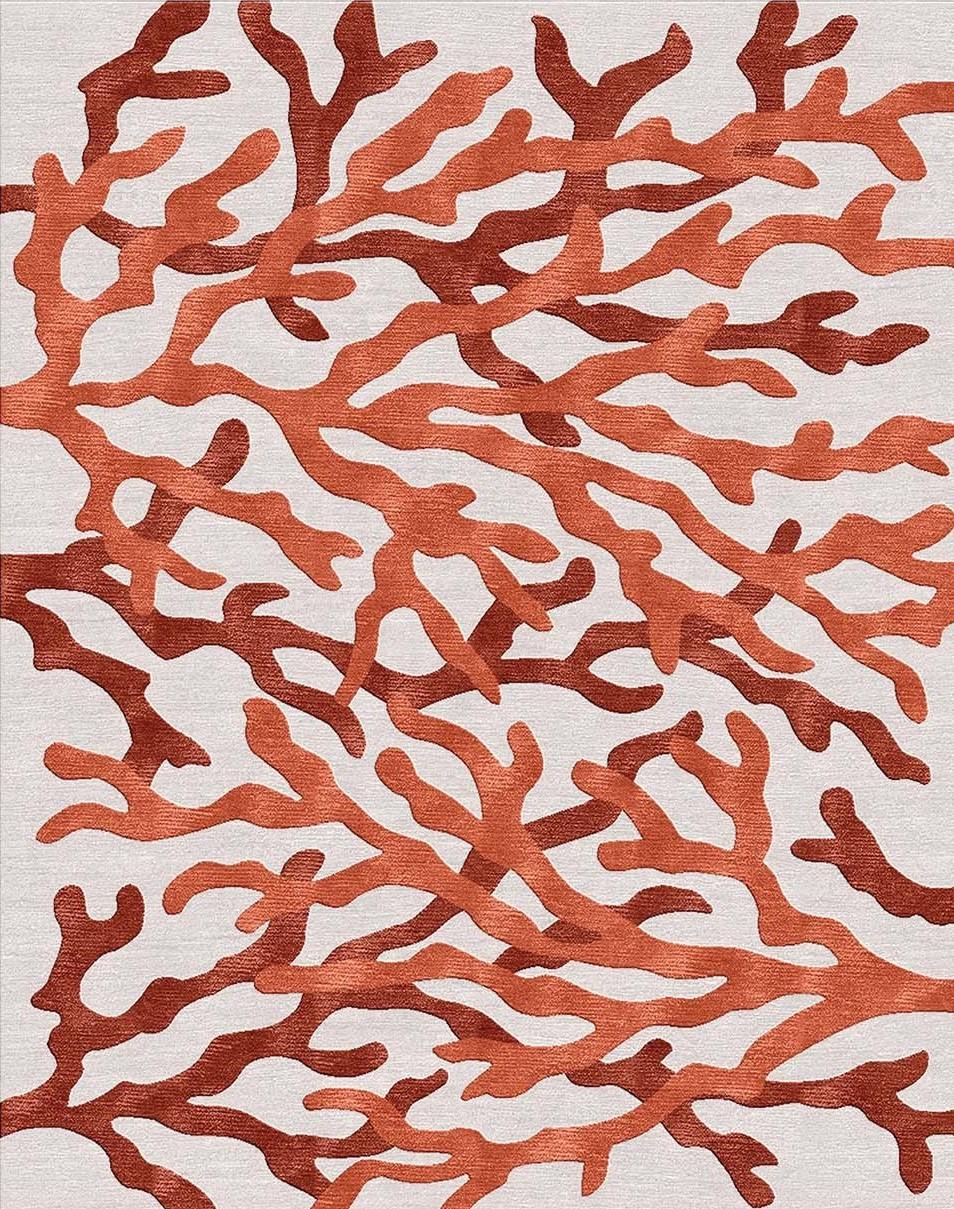 Dieser atemberaubende Teppich ist eine stimmungsvolle Bodendekoration aus der Marina-Kollektion, inspiriert von den leuchtenden Farben und dynamischen Formen der Korallen. Handgeknüpft von erfahrenen Kunsthandwerkern in Nepal, die seit 1959 mit
