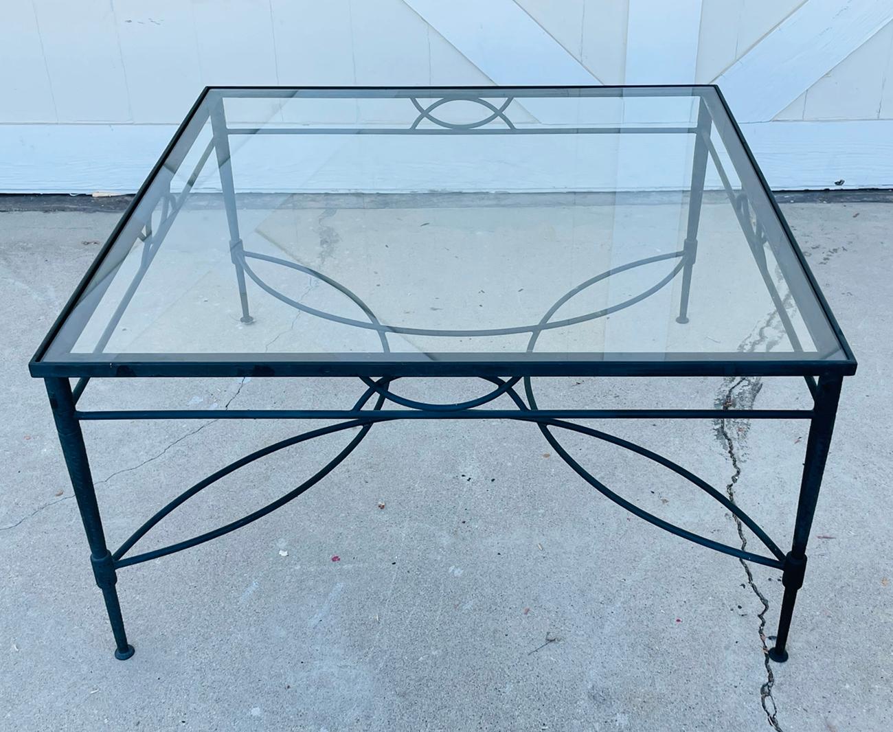 Beautiful coffee table by Janus et Cie and part of the Amalfi collection.

The table is made in solid steel with a slate finish and a glass top.

Measurements:
36 inches wide x 36 deep x 19 inches high.