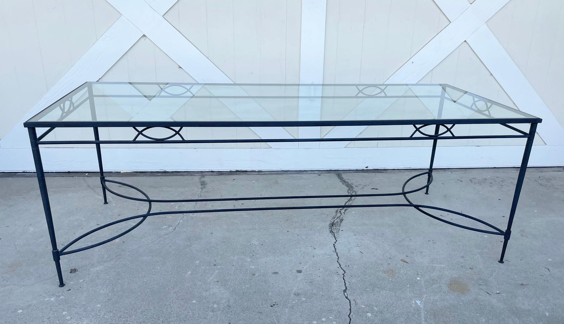 Beautiful dining table executed in Iron and glass designed and manufactured by Janus et Cie and part of the Amalfi Collection.

The table has a glass top.

Measurements:
84 inches wide x 36 inches deep x 29 inches high.