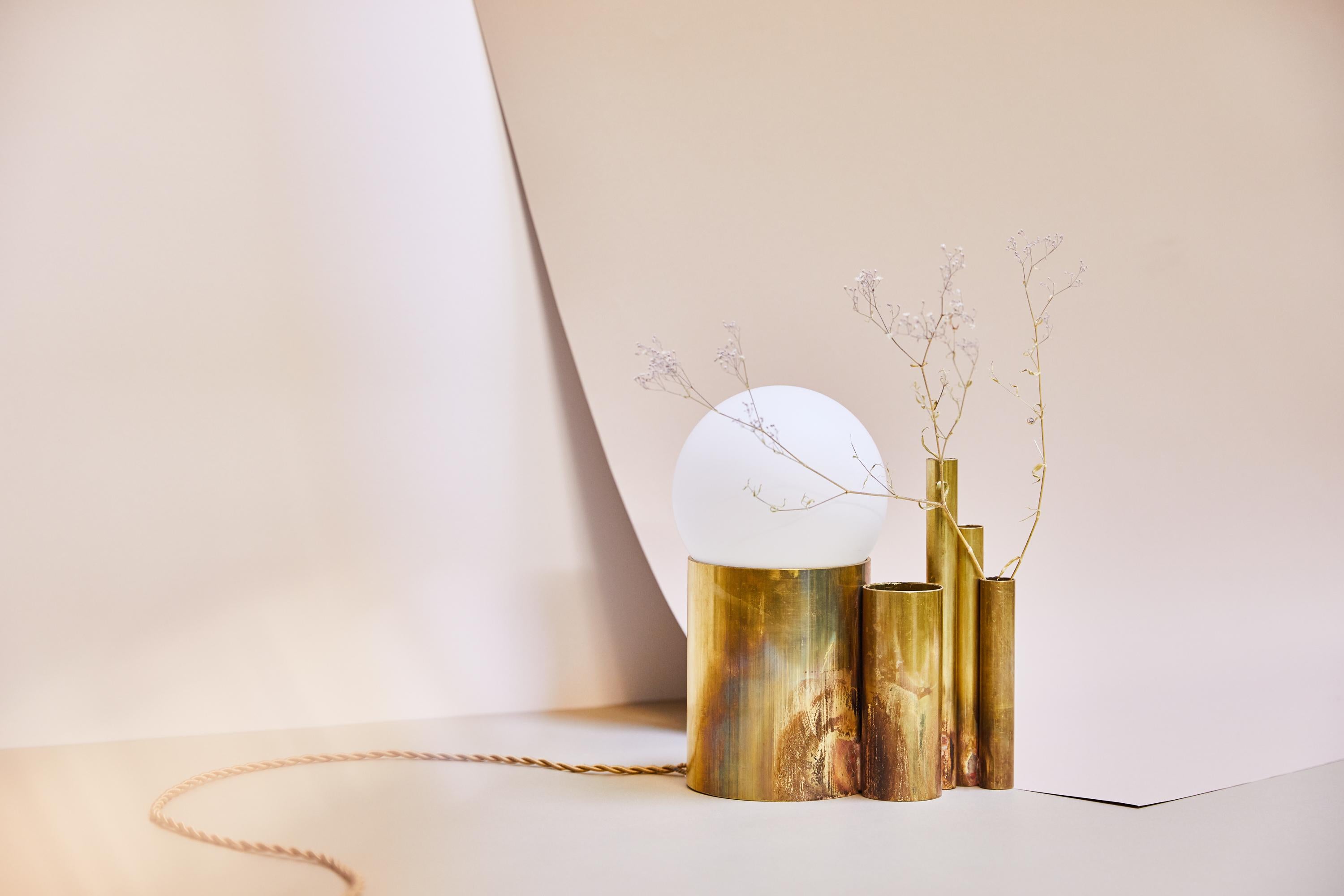Amalgam II, brass table lamp signed by Pia Chevalier
Raw brass, silver solders and porcelain.
Dimensions 19 cm x 19 cm
Exists also in Large: 24 cm x 28 cm
Tala bulb diameter 13 cm
Cable length 1m50

Pia Chevalier is a French contemporary